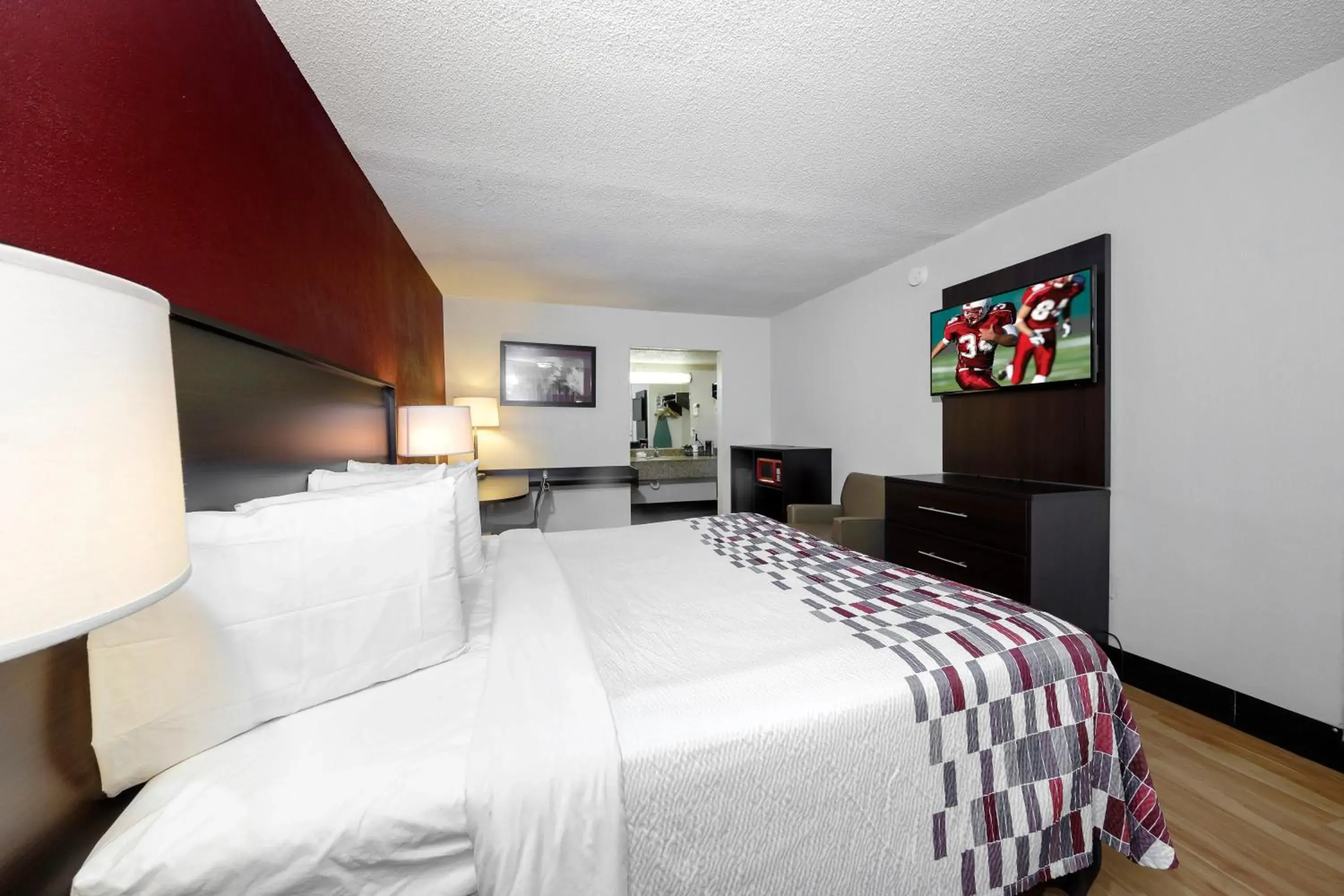 Photo of the whole room, Bed in Red Roof Inn Atlanta - Suwanee/Mall of Georgia Photo of the whole room, Bed in Red Roof Inn Atlanta - Suwanee/Mall of Georgia