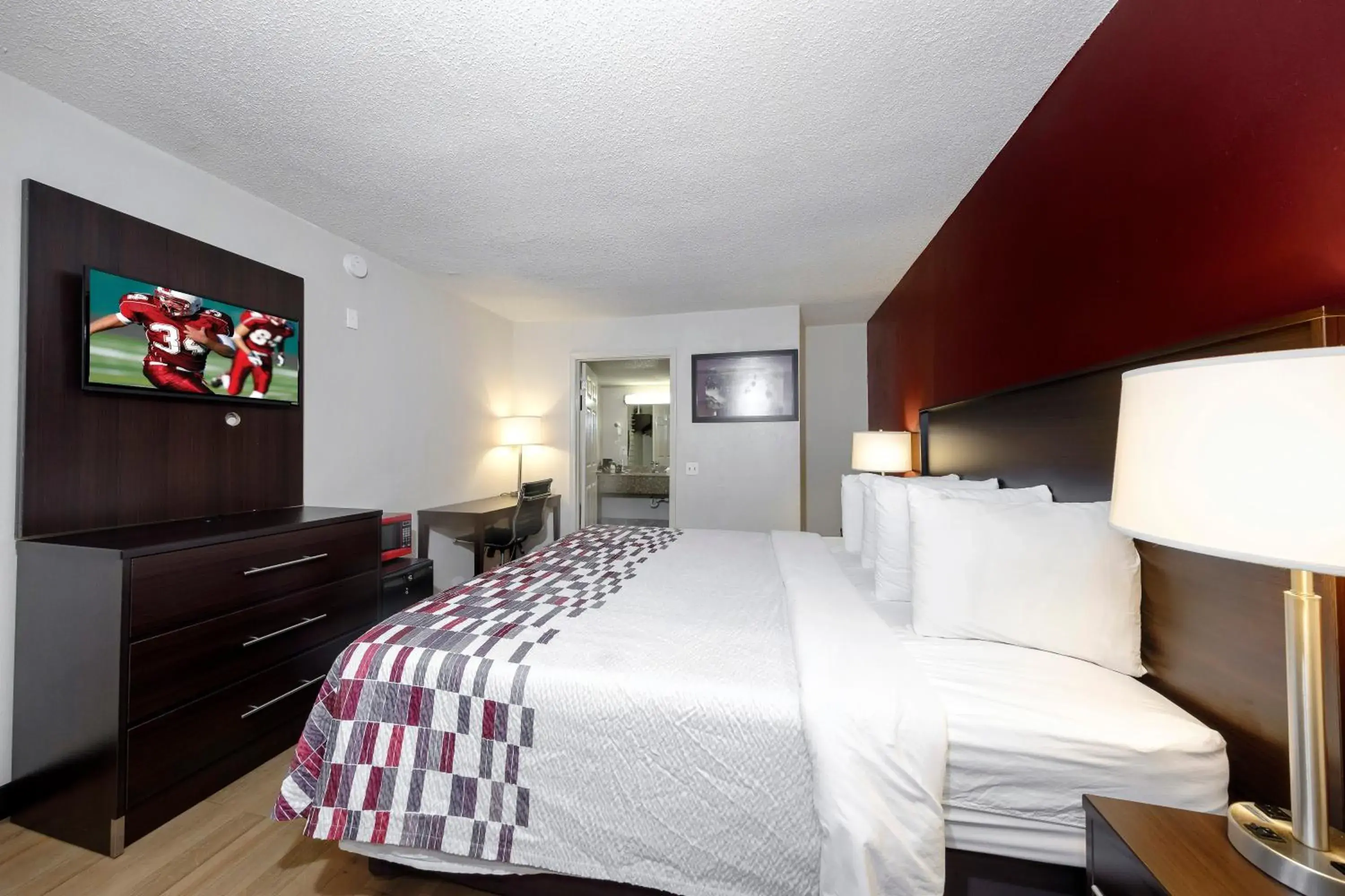 Photo of the whole room, Bed in Red Roof Inn Atlanta - Suwanee/Mall of Georgia Photo of the whole room, Bed in Red Roof Inn Atlanta - Suwanee/Mall of Georgia