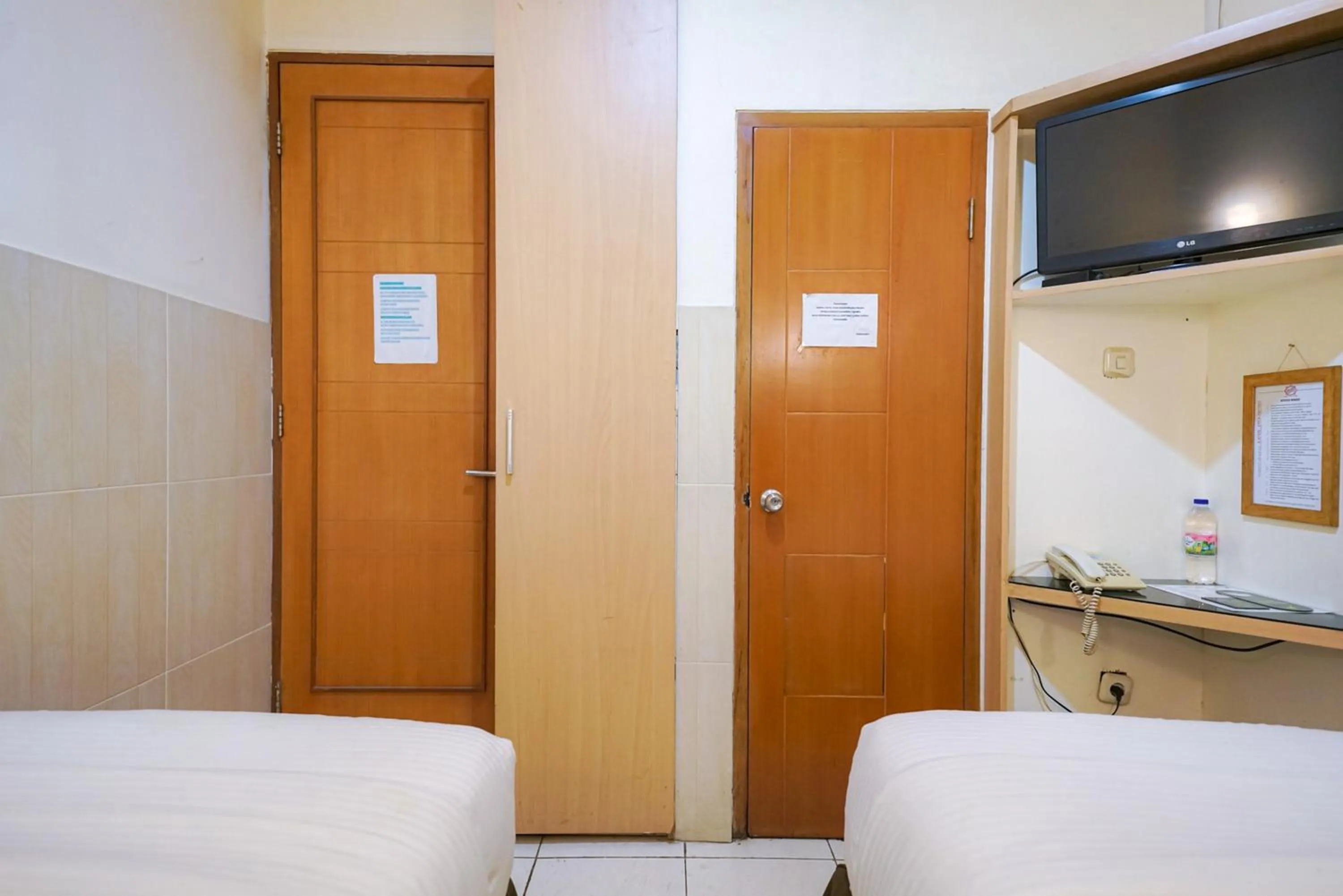 Bedroom, Bed in Urbanview Hotel 58 Bintaro