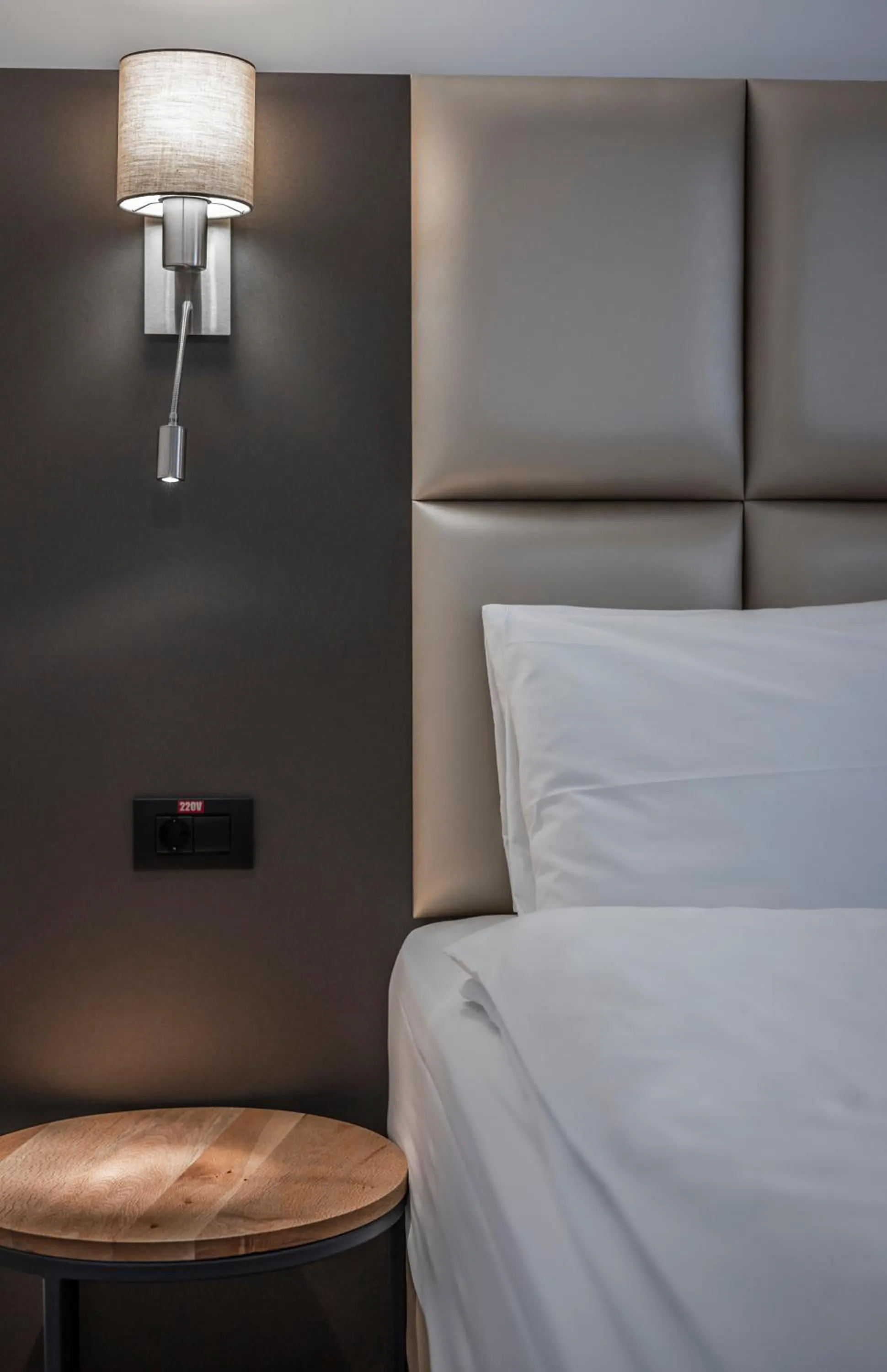 Bed in Charm Boutique Hotel