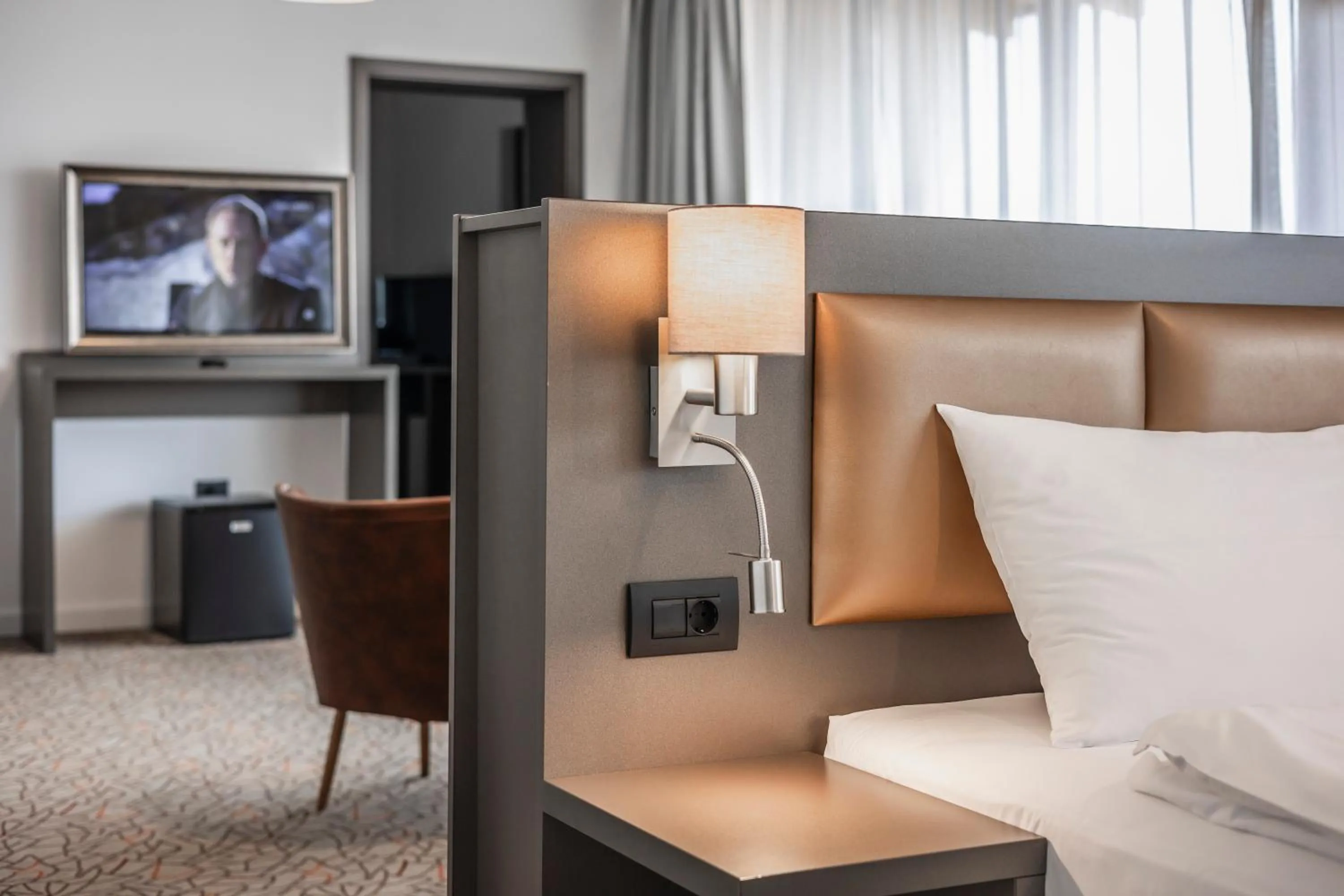 Bed in Charm Boutique Hotel