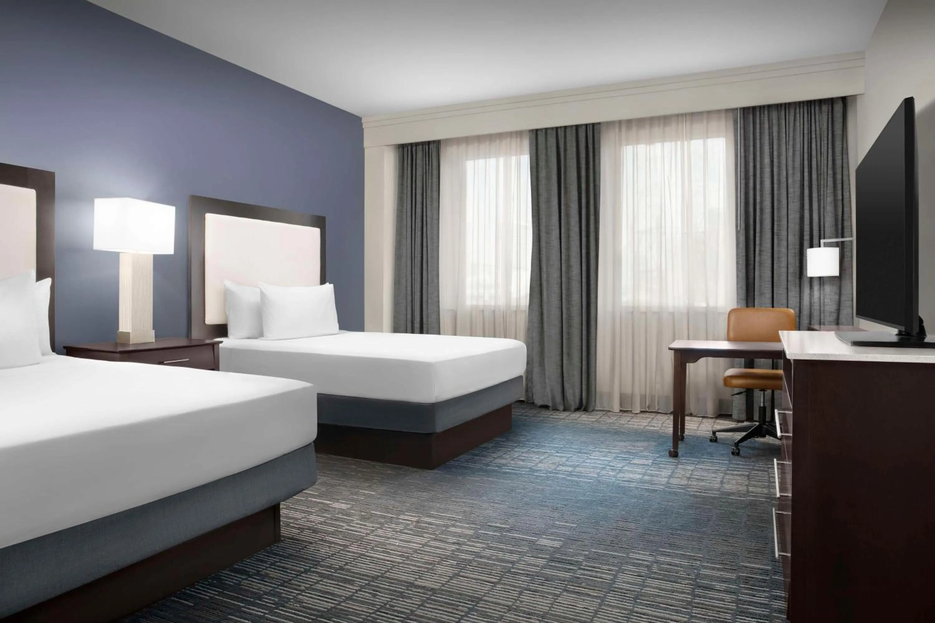 Bed in Homewood Suites Dallas Downtown