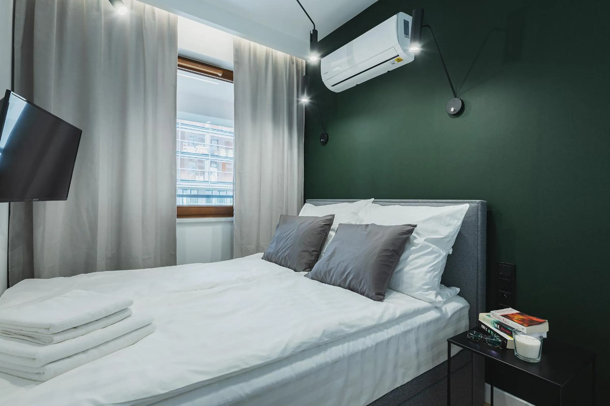 Bed in YourSecondFlat Grzybowska