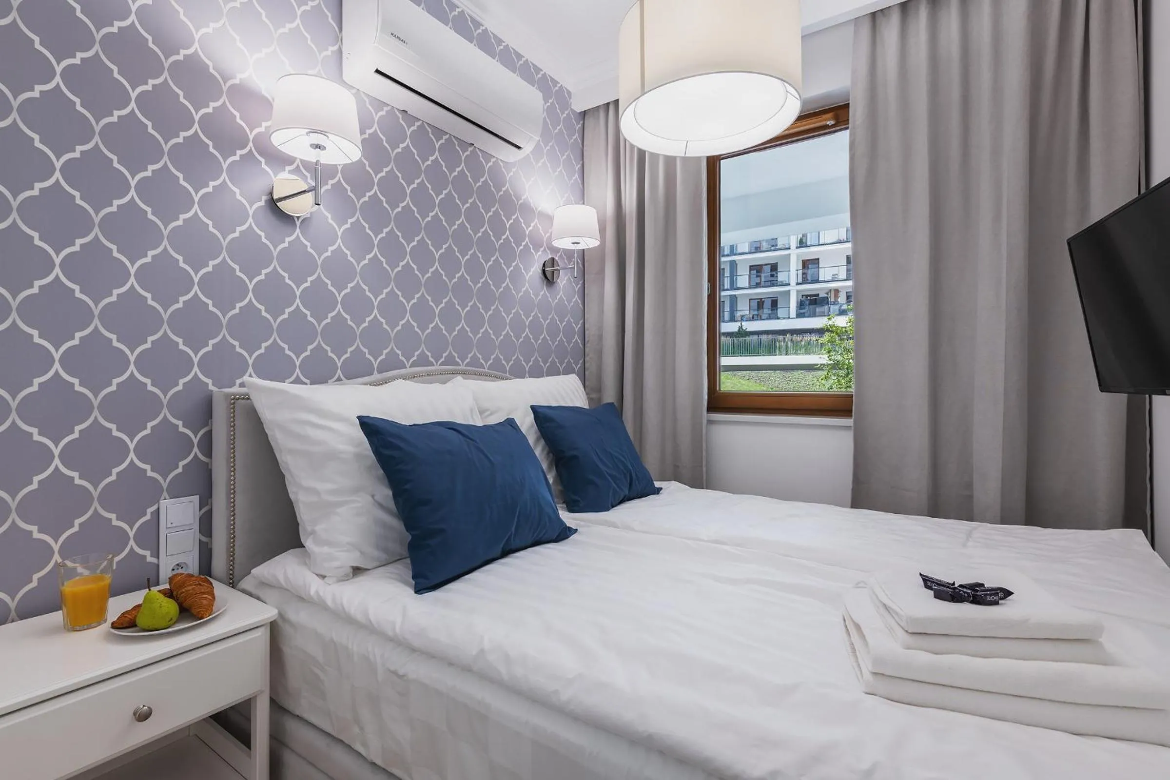 Bed in YourSecondFlat Grzybowska