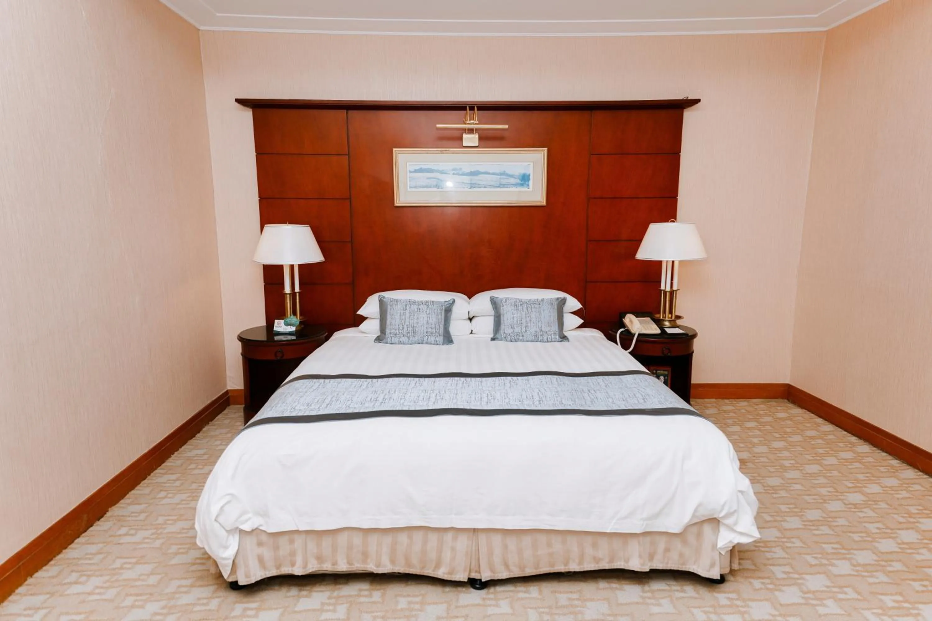 Bed in Ruishi Hotel Dalian