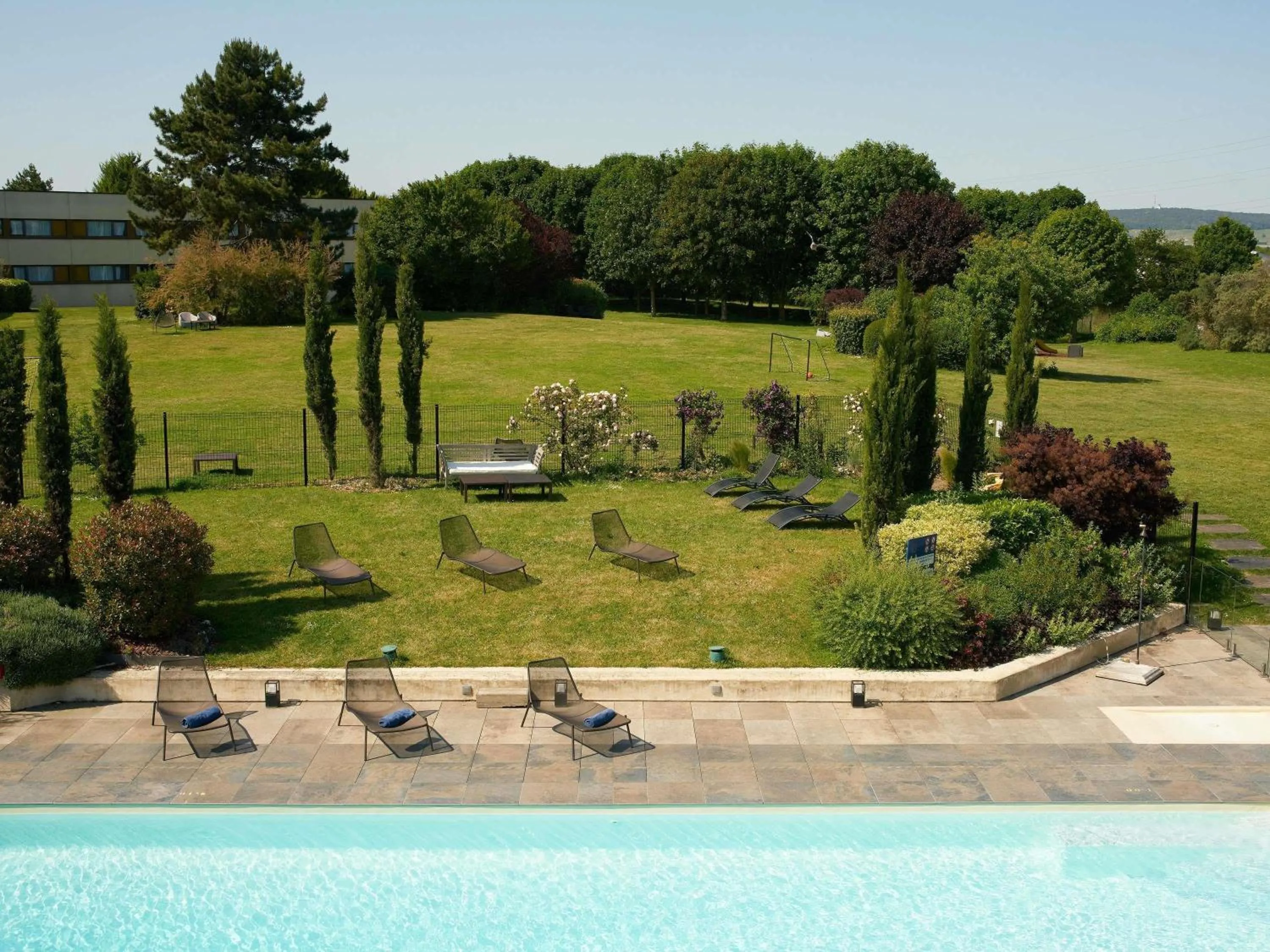 Pool view in Novotel Reims Tinqueux