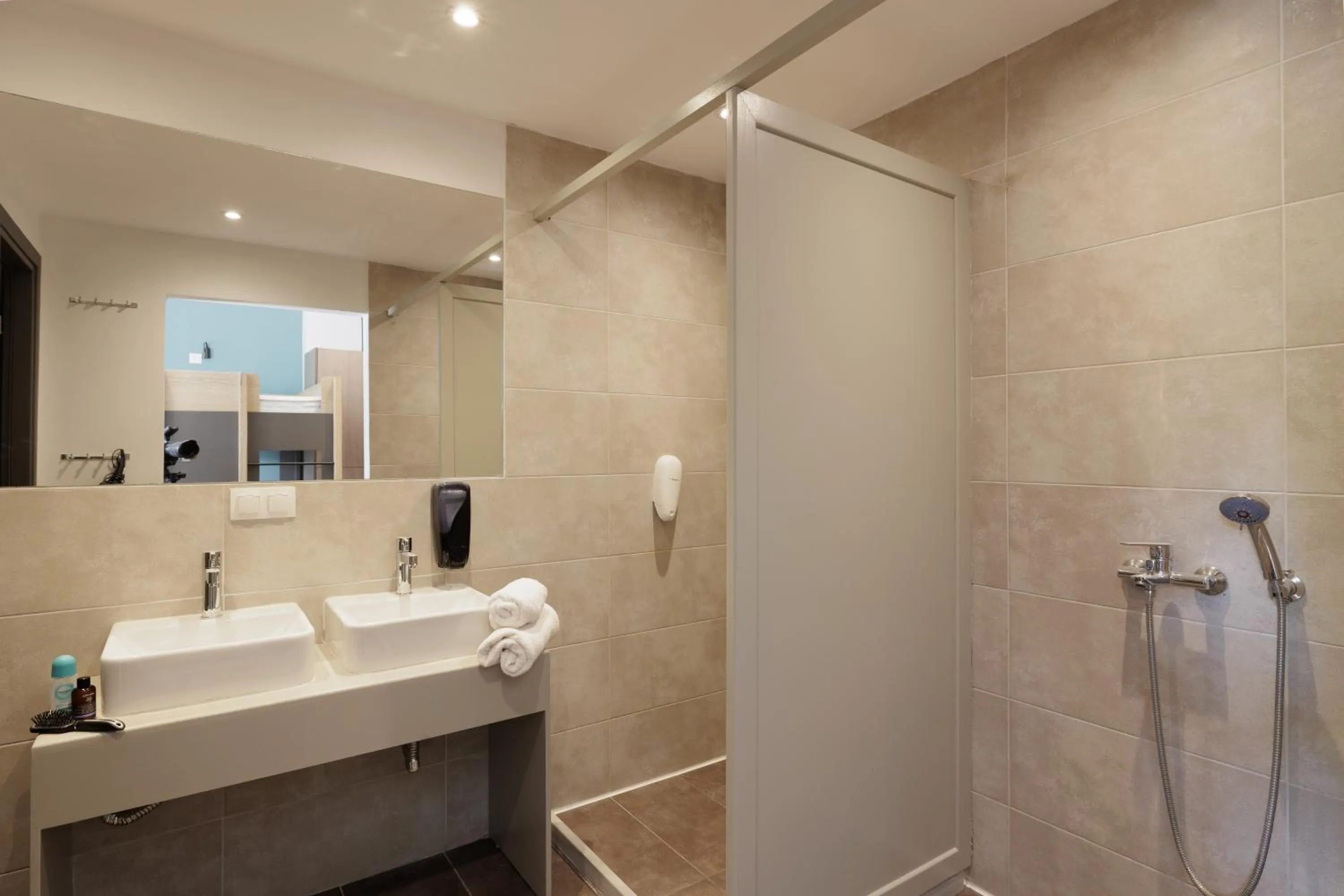 Shower in Local Hostel & Suites