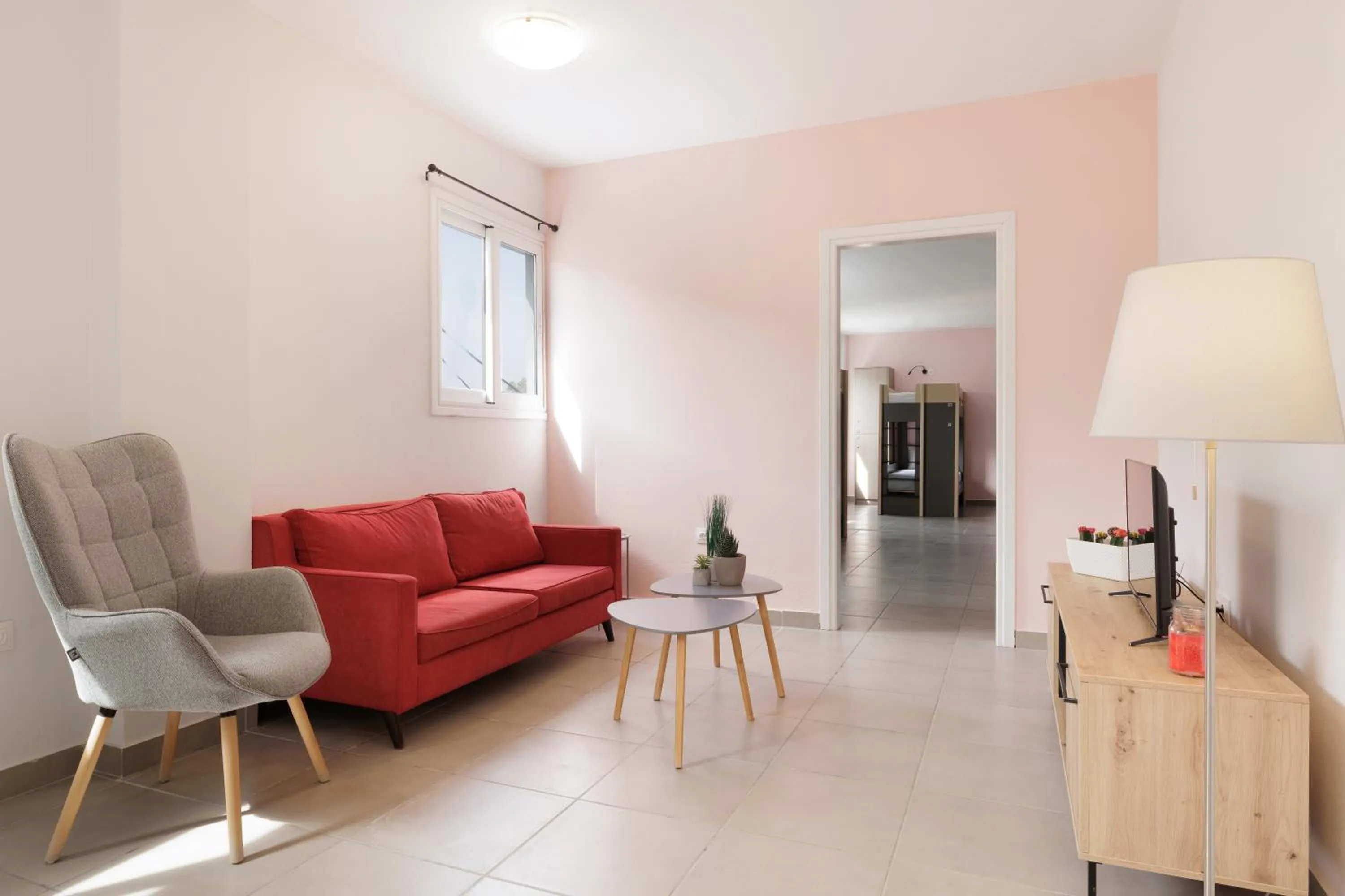 Living room in Local Hostel & Suites