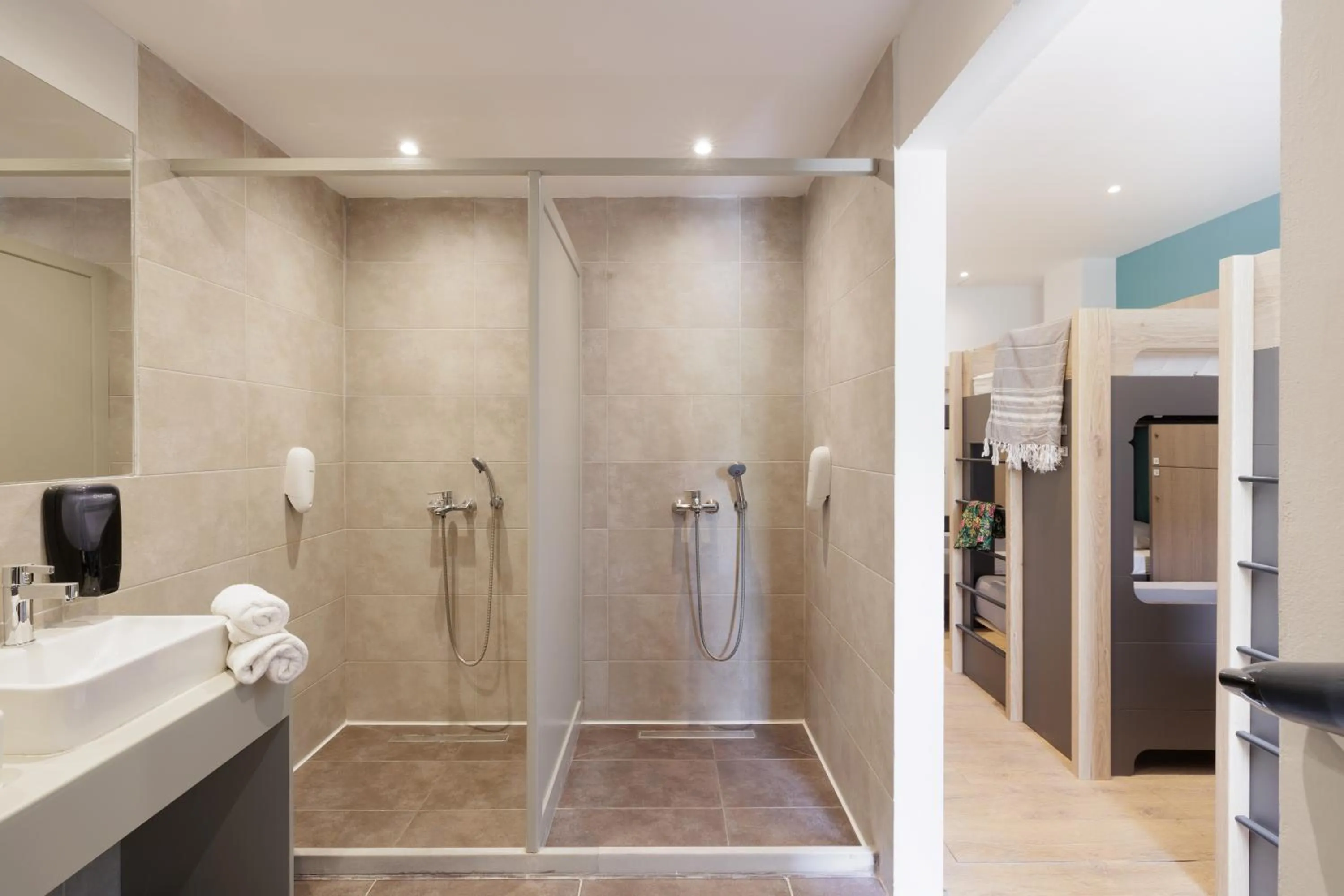 Shower in Local Hostel & Suites