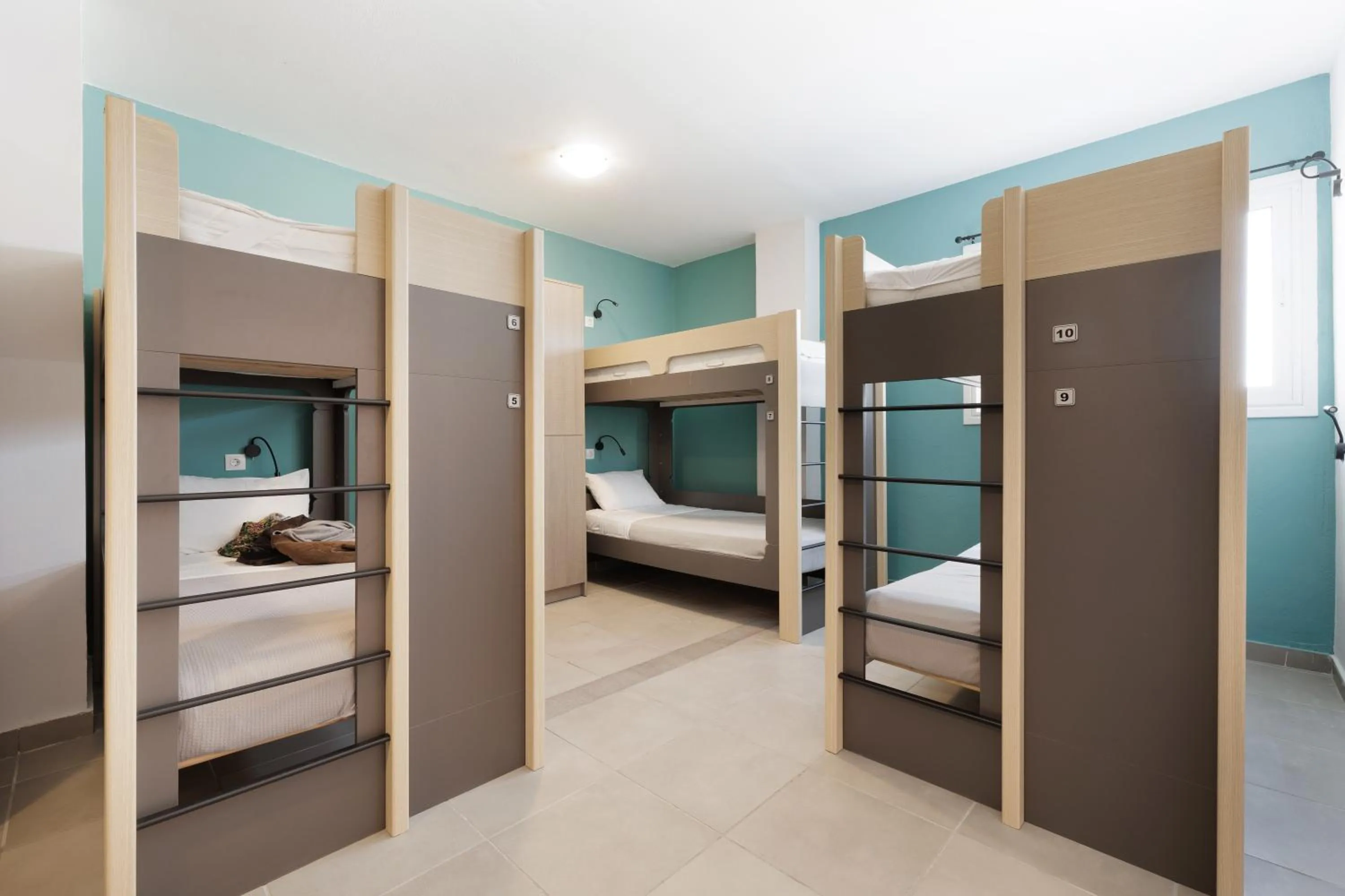 Bed in Local Hostel & Suites