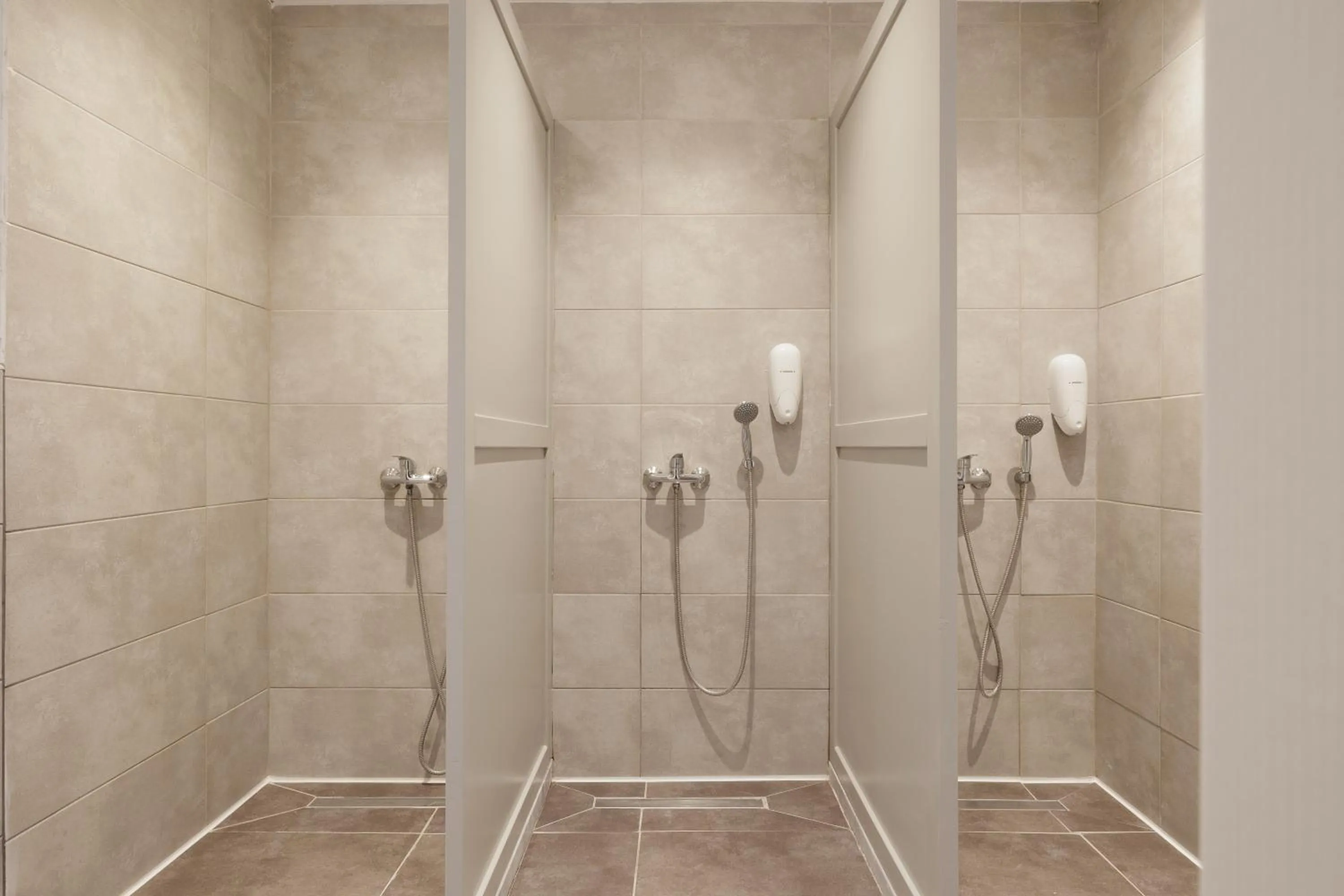 Shower in Local Hostel & Suites