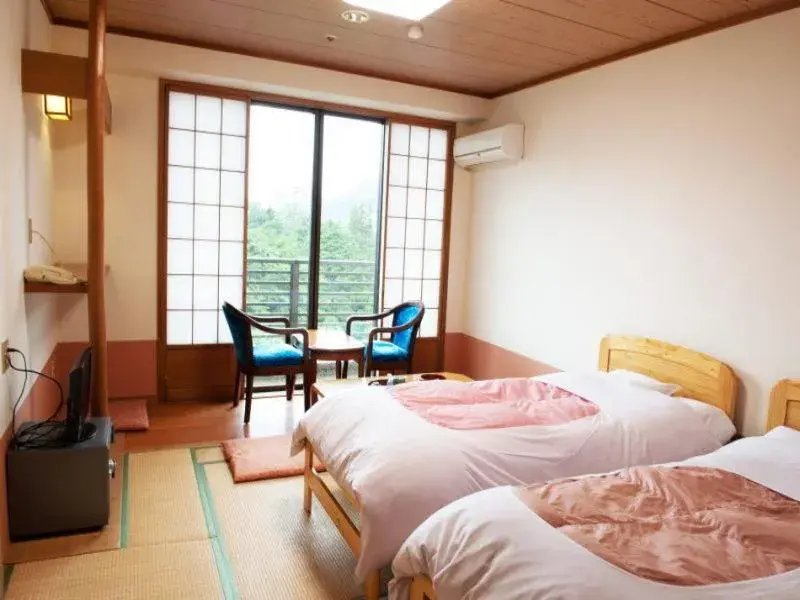 Bed in Hotel New Ohruri Bed in Hotel New Ohruri