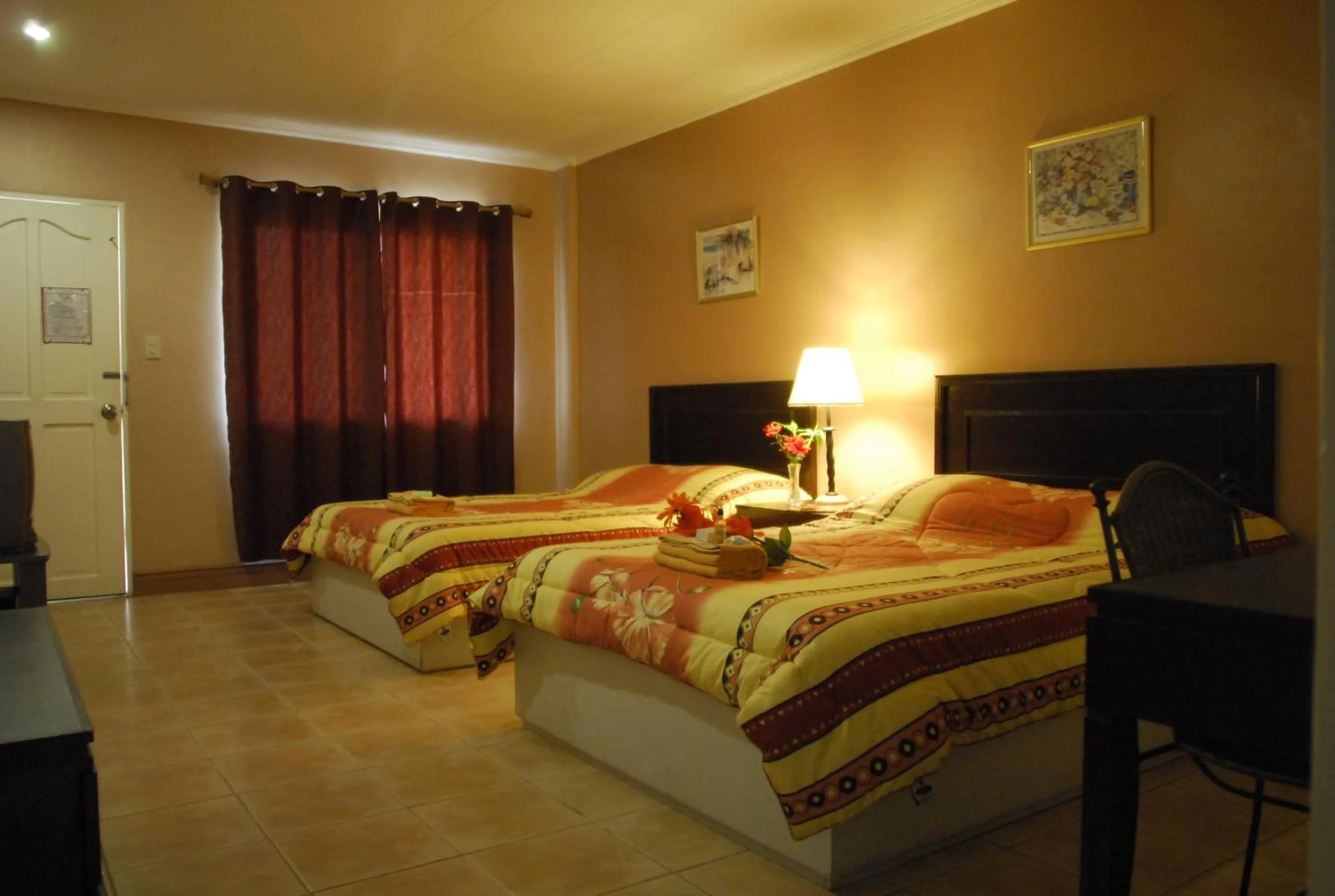 Bedroom, Bed in Playa Papagayo Beach Inn