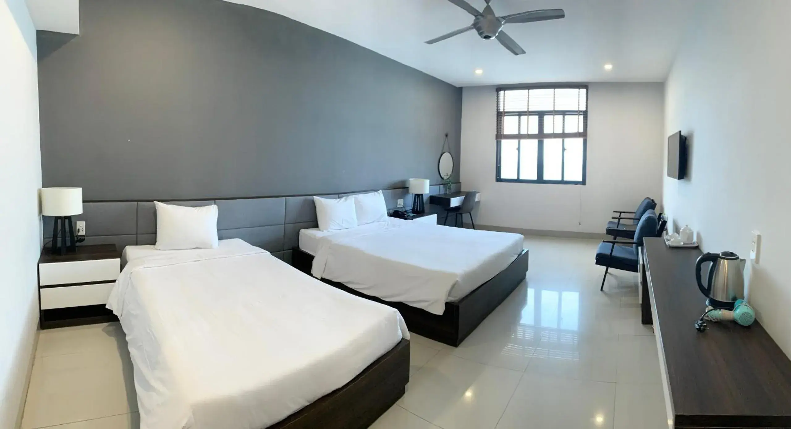 Deluxe Queen Room with Two Queen Beds in My Khe 2 Da Nang Seafront Hotel Deluxe Queen Room with Two Queen Beds in My Khe 2 Da Nang Seafront Hotel