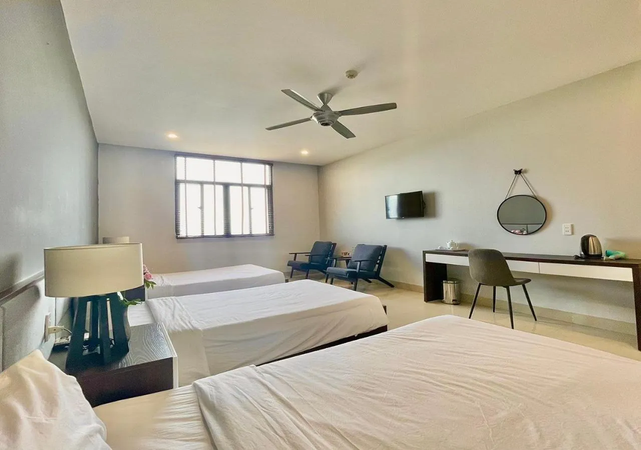 Living room, Bed in My Khe 2 Da Nang Seafront Hotel