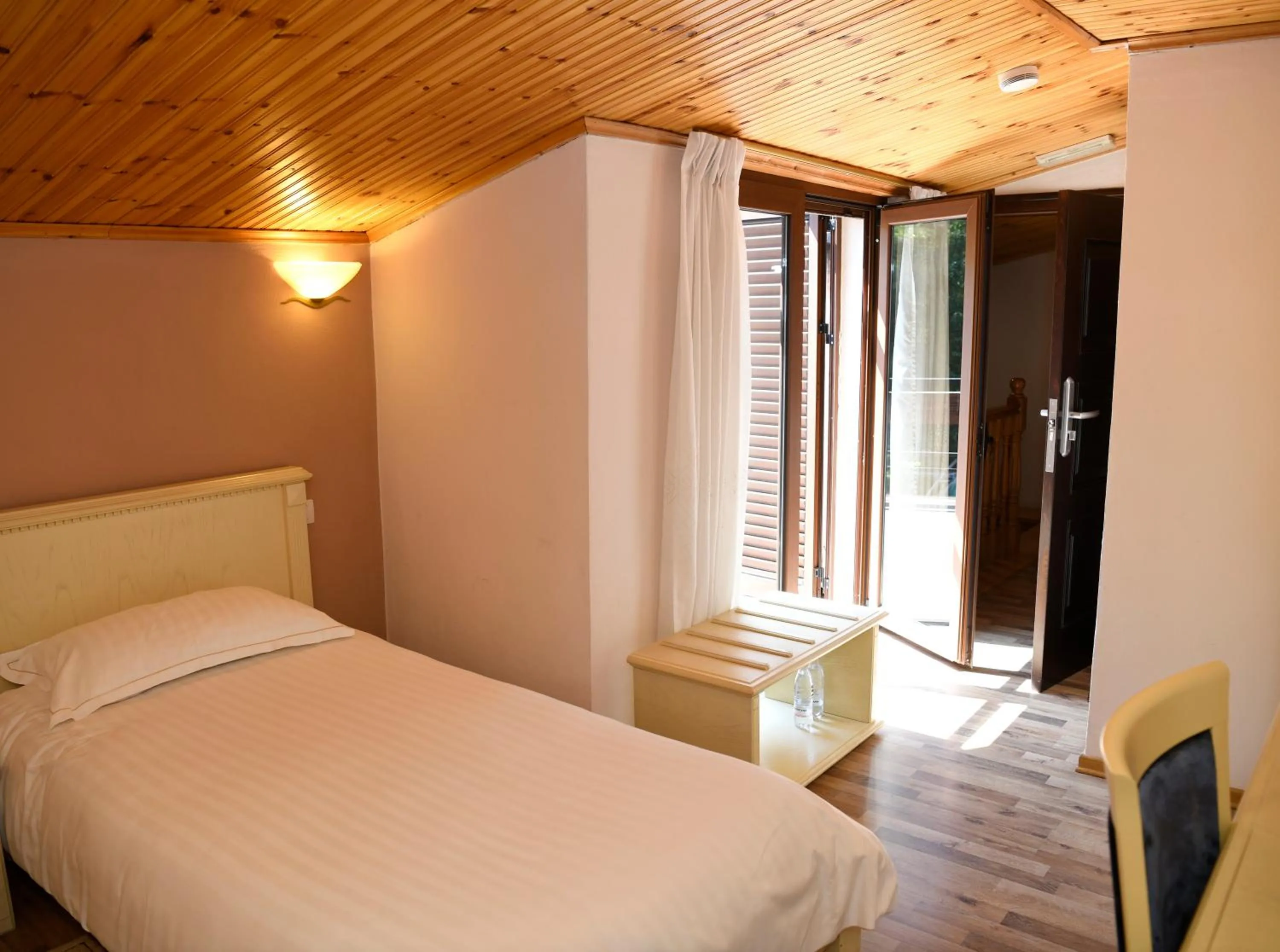 Bed in Hotel Restaurant Dreri