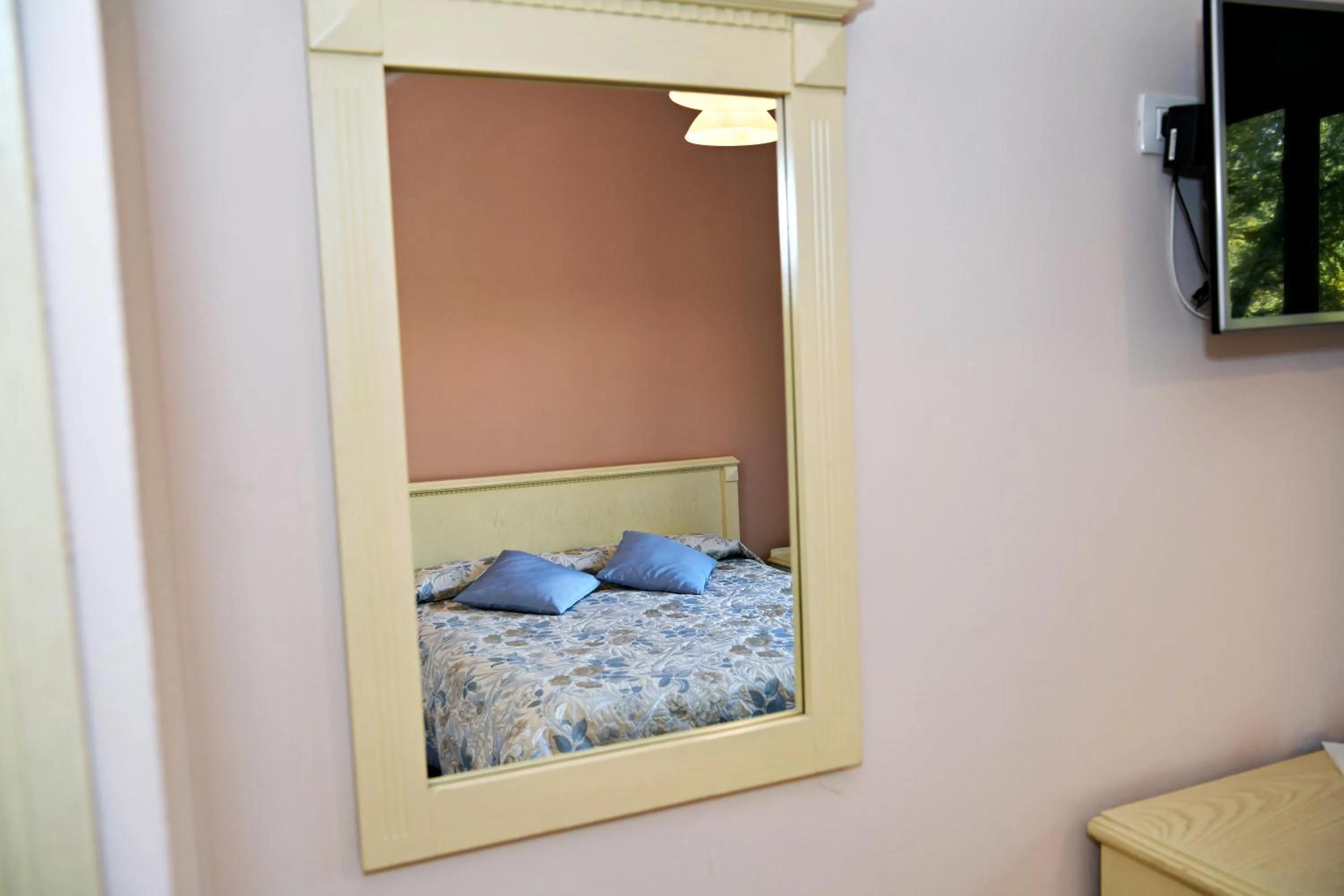 Bed in Hotel Restaurant Dreri