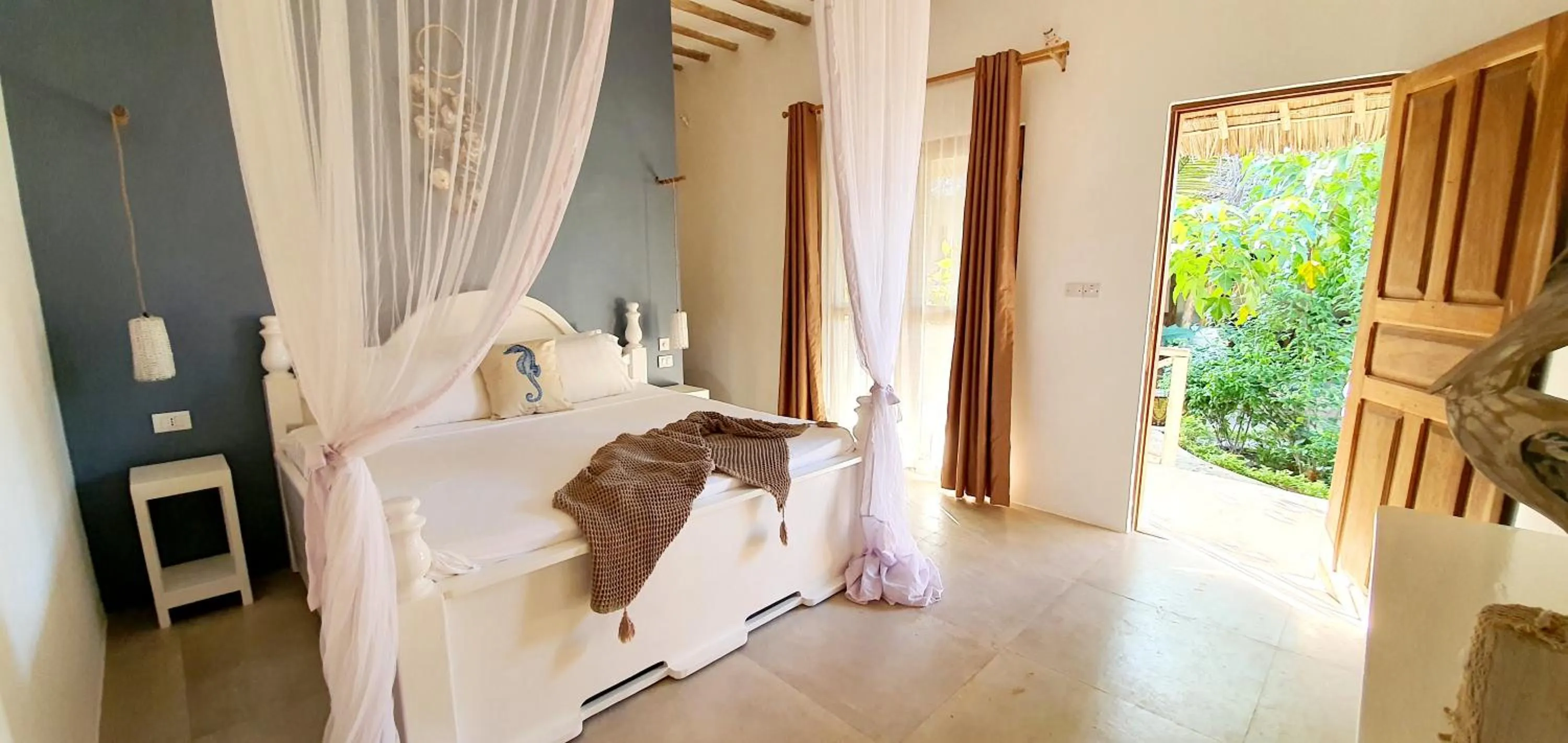 Bed in ARYA Boutique Resort