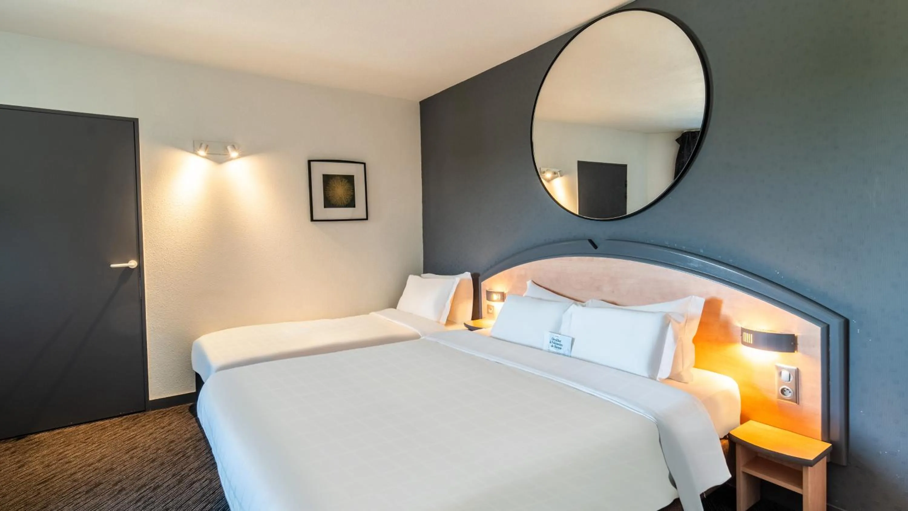 Photo of the whole room, Bed in Hôtel Kyriad Brive Ouest