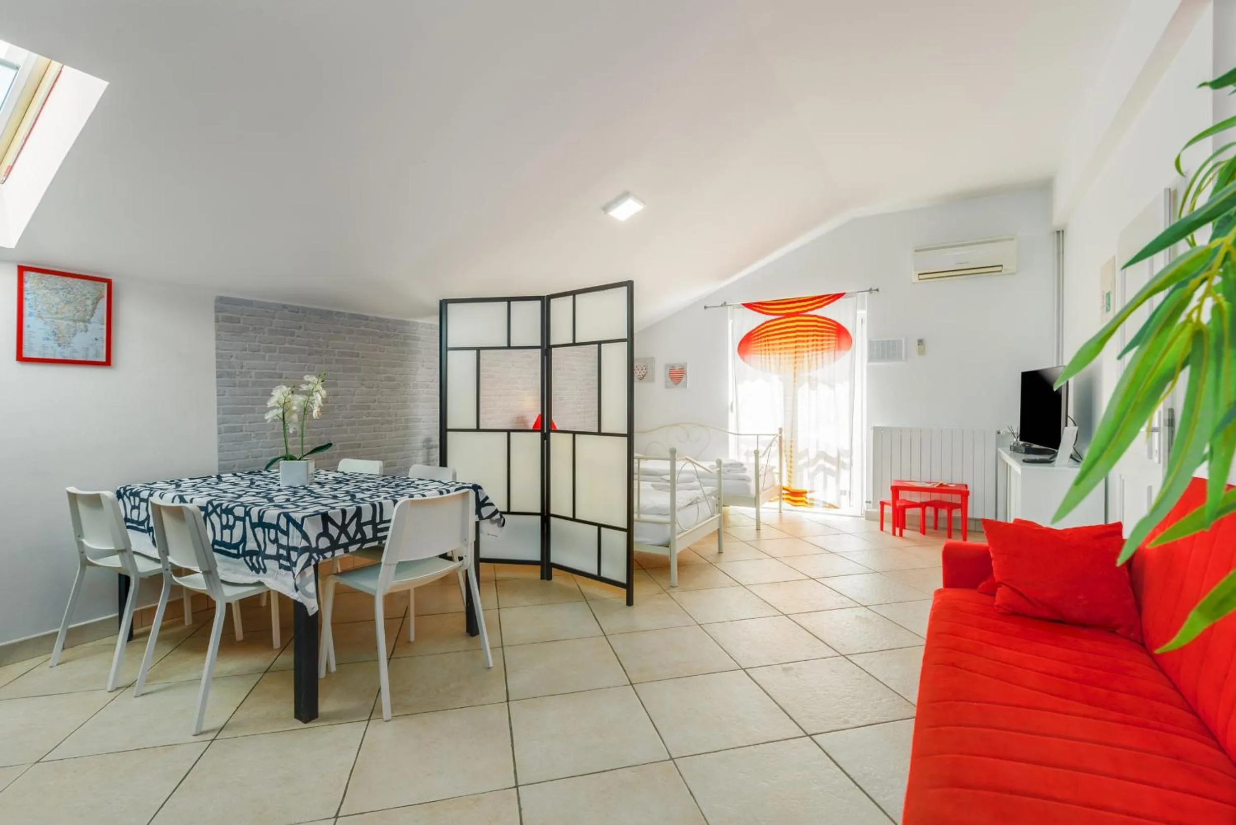 TV and multimedia in Trbović Apartments Peaceful stay with Free Parking, Pet-Friendly, and Bike Storage in Umag