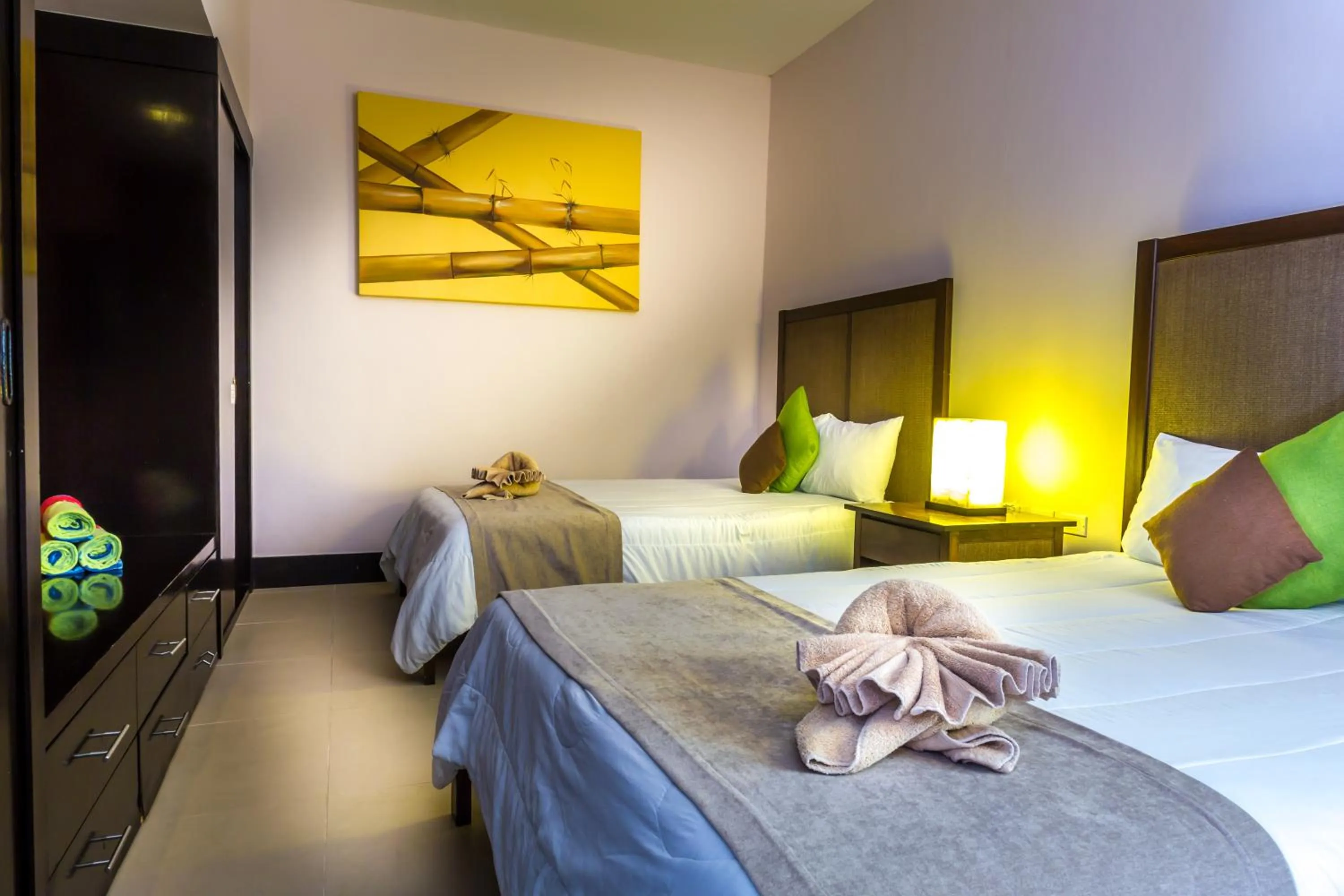 Bed in Aldea Beachside Condo by BVR