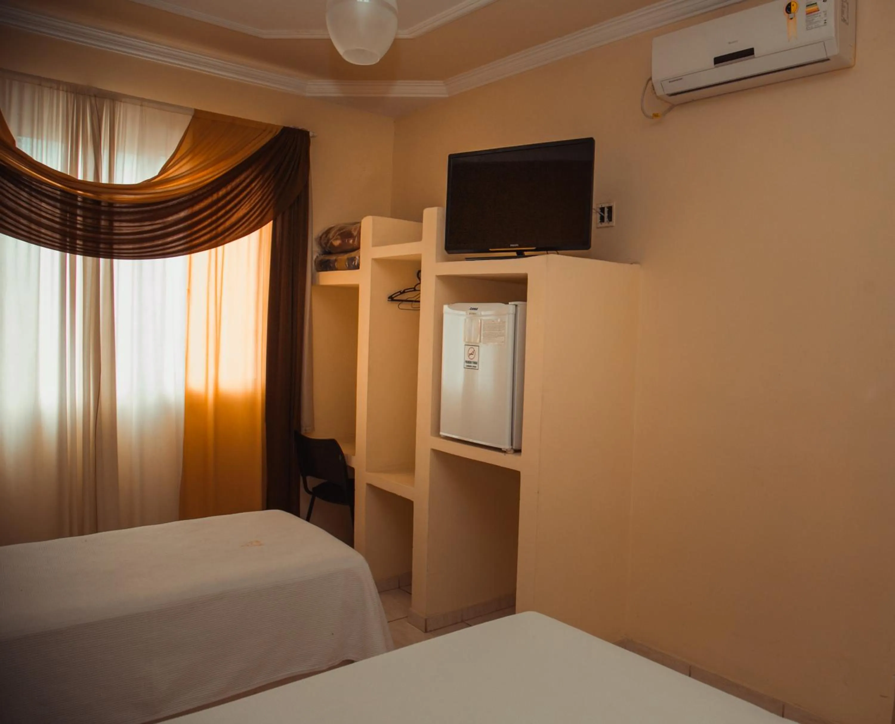 Photo of the whole room, Bed in Hotel Meri Conselheiro Lafaiete