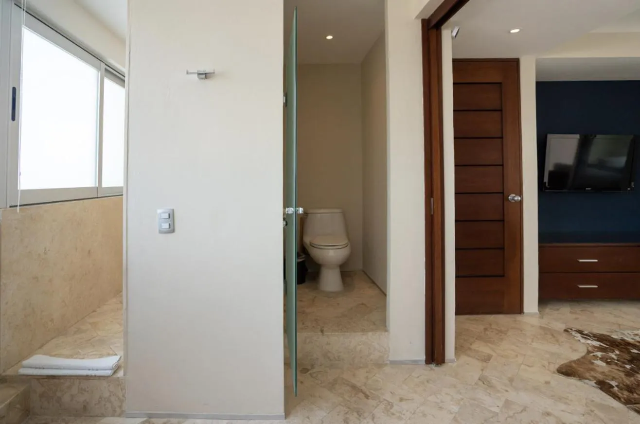 Shower in Magia Beachside Apartment by BVR