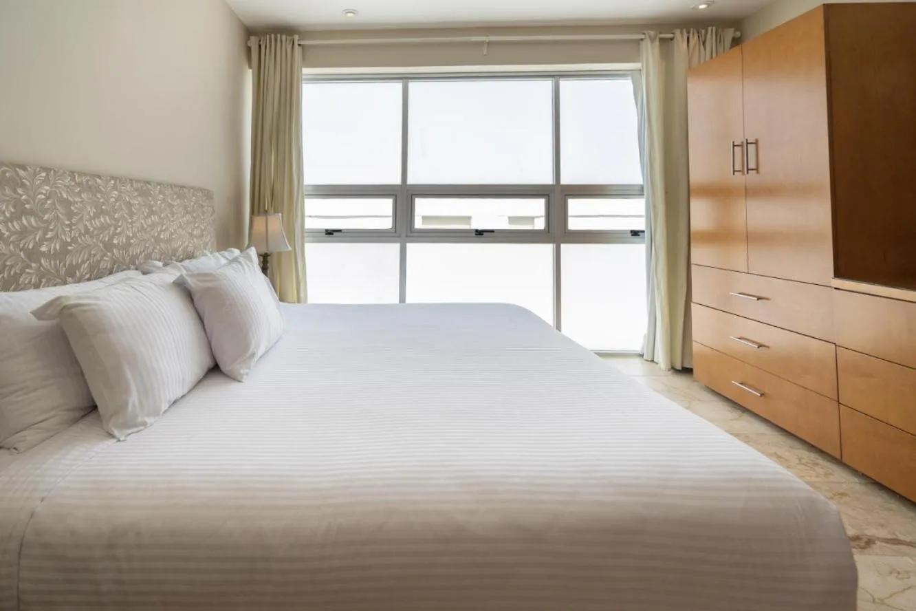 Bed in Magia Beachside Apartment by BVR