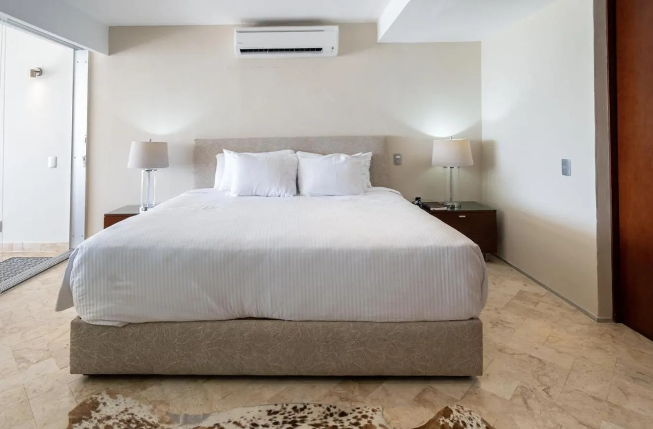 Bed in Magia Beachside Apartment by BVR