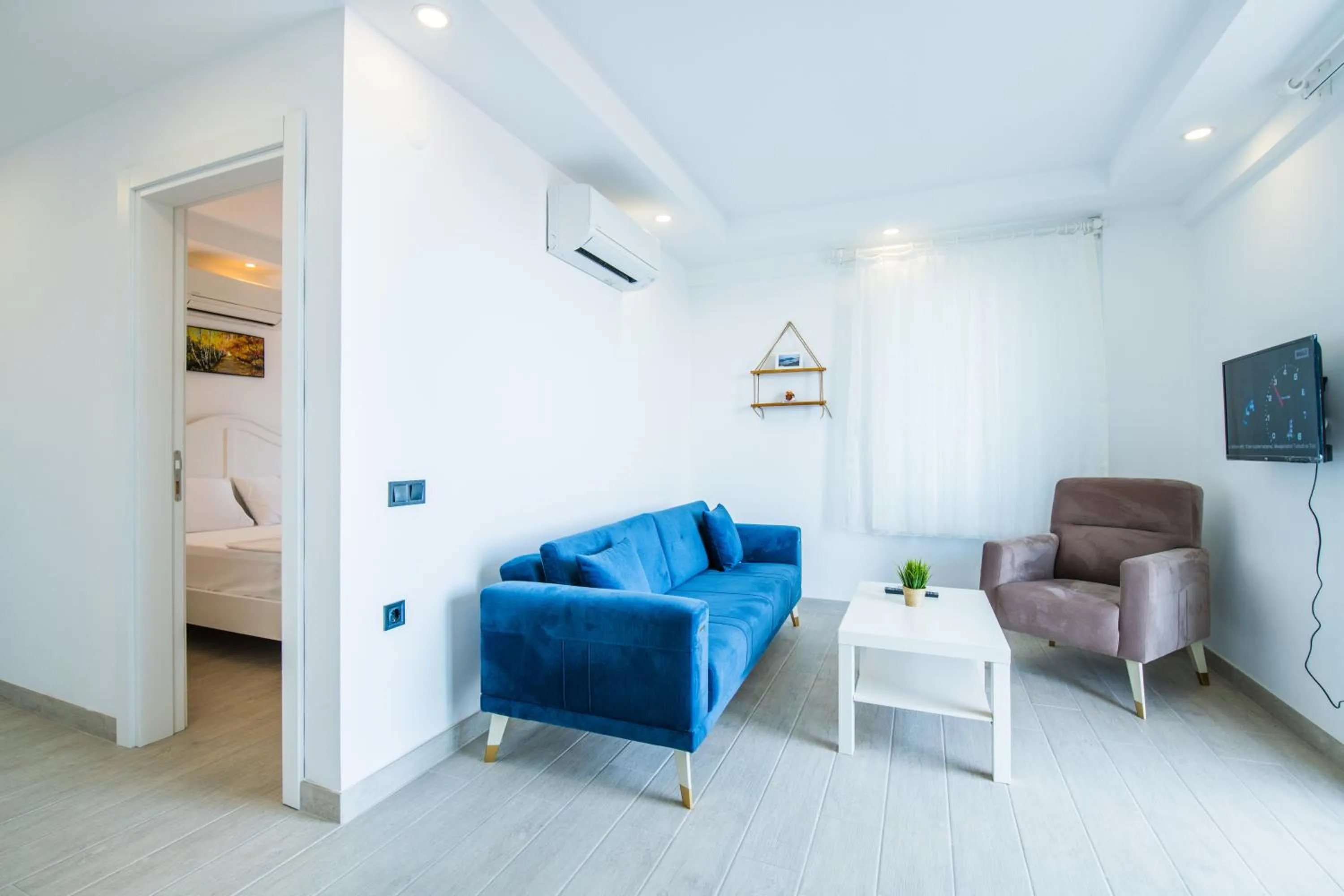 Communal lounge/ TV room, Bed in Carpediem Apart