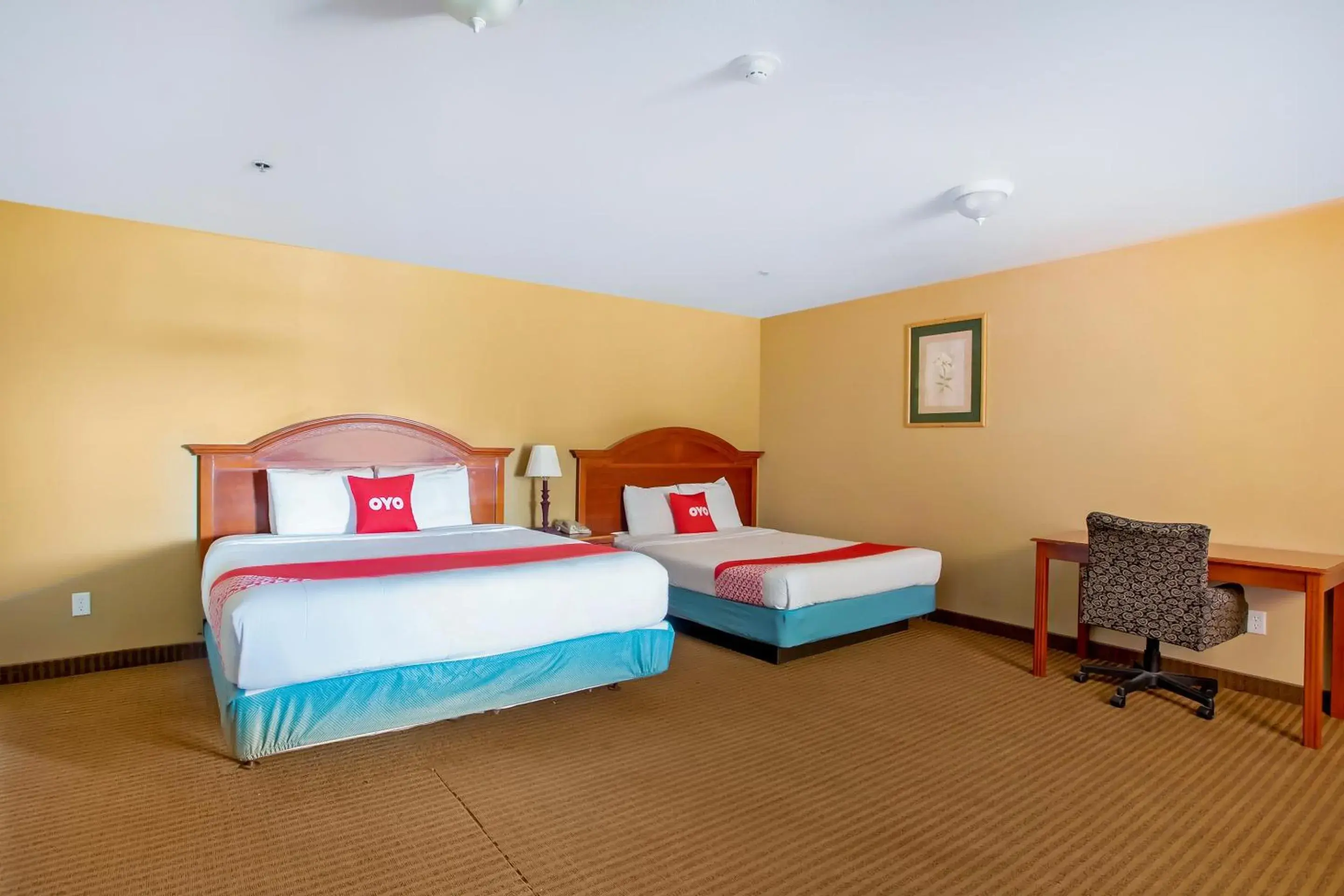 Bedroom, Bed in OYO Hotel Jacksboro TX - Fort Richardson Bedroom, Bed in OYO Hotel Jacksboro TX - Fort Richardson