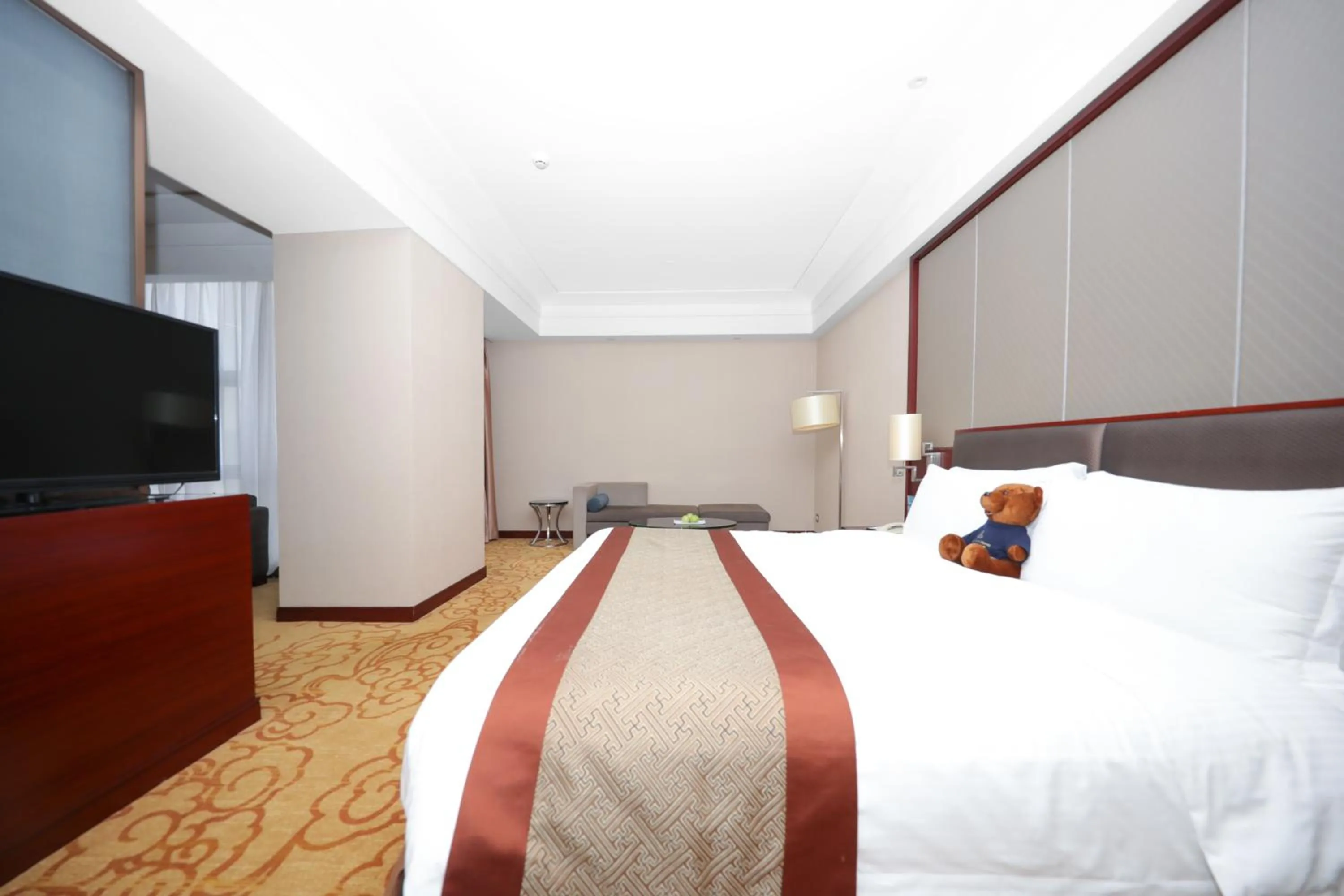 Bed in Shenzhen Avant-Garde Hotel