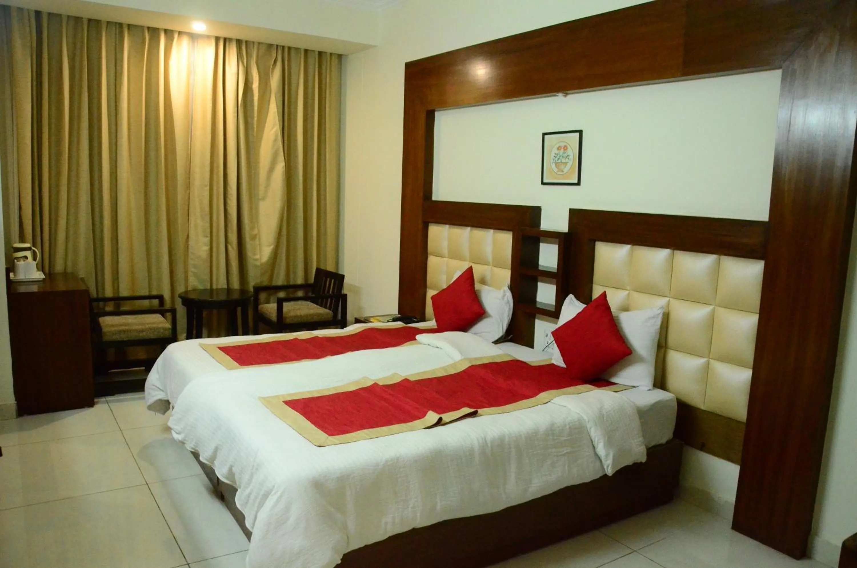 Bed in Hotel Milam Inn