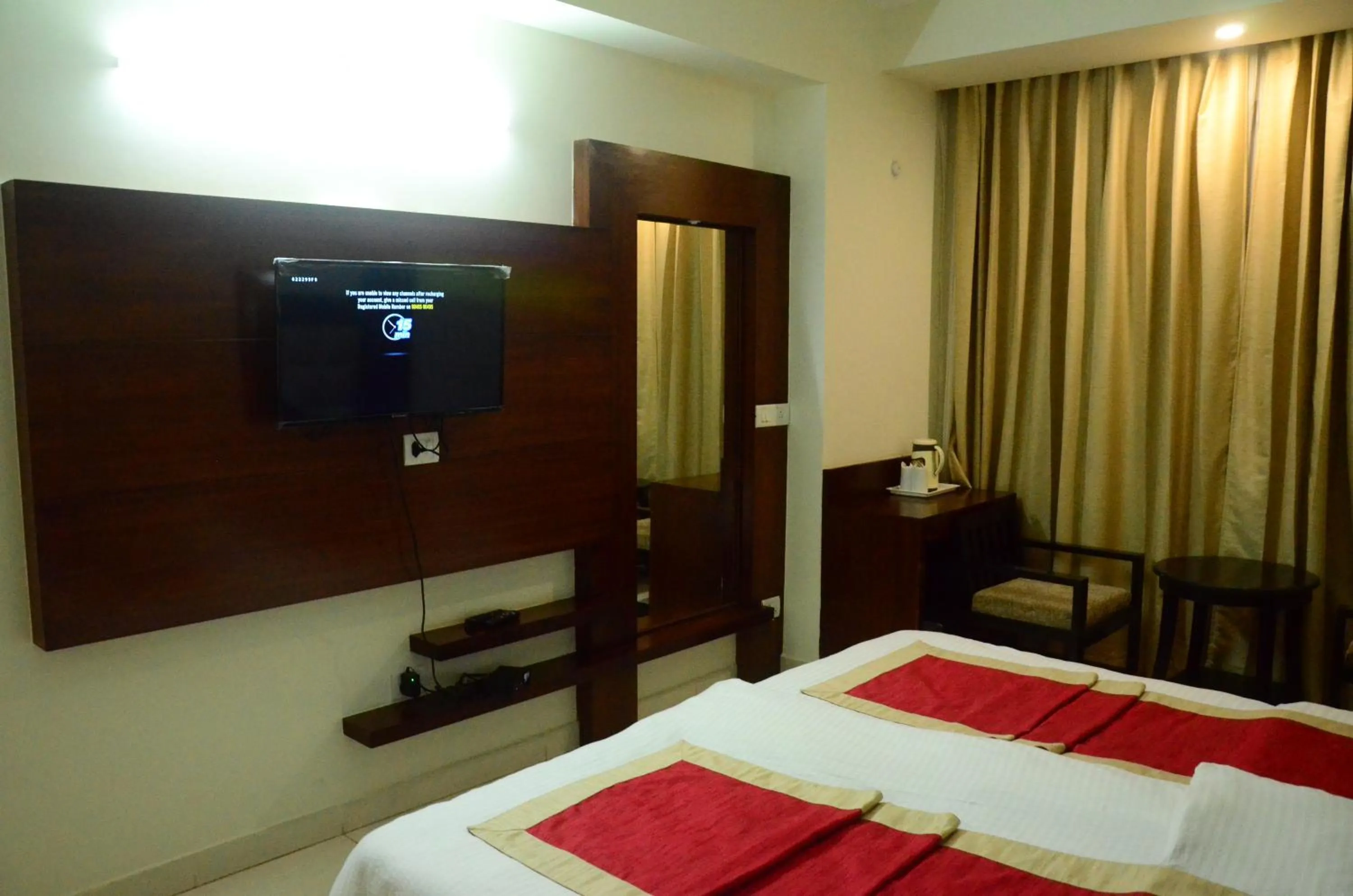 Bed in Hotel Milam Inn