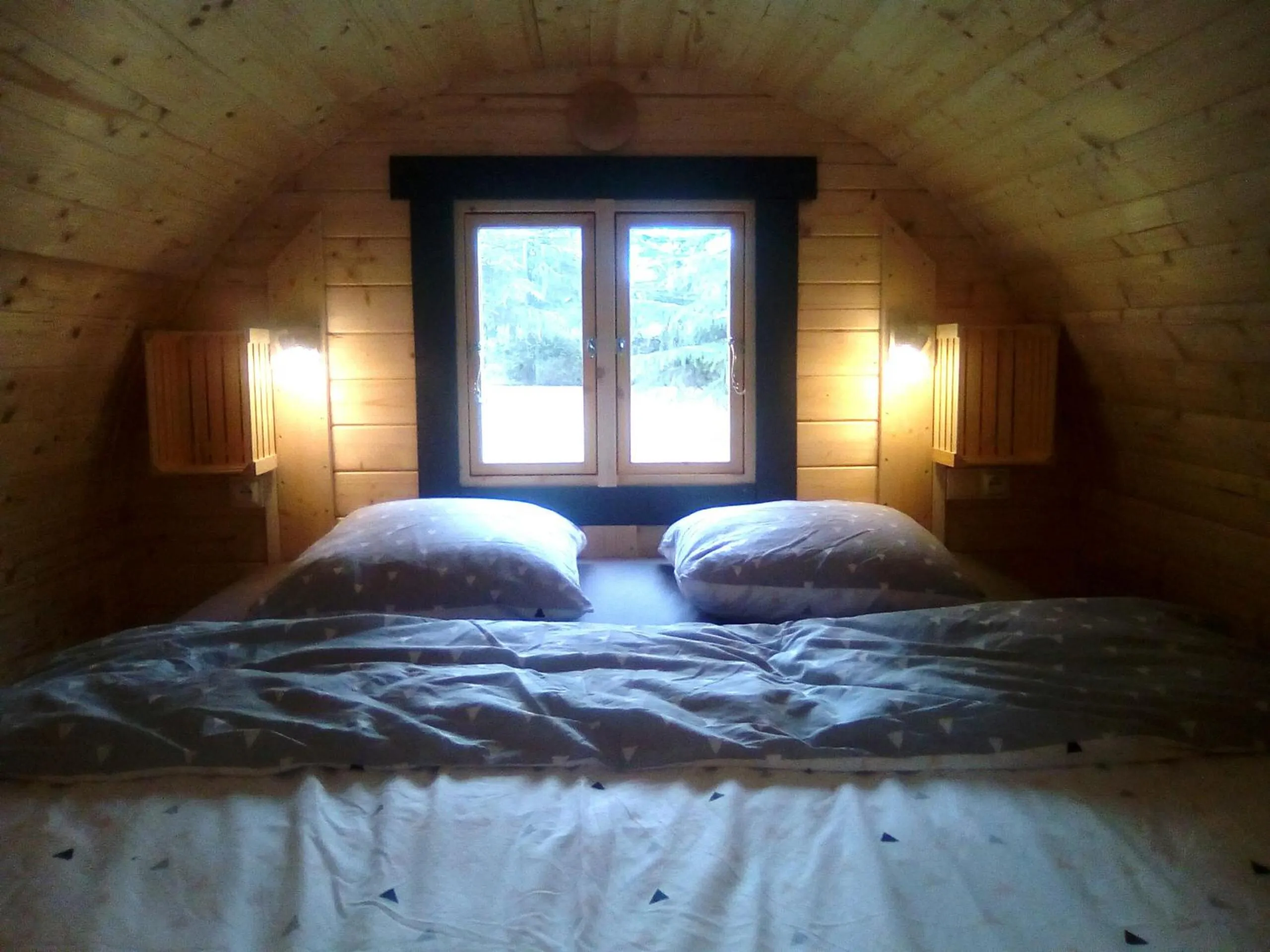 Bed in LES TONNEAUX DE L'EURE LOGEMENT INSOLITE