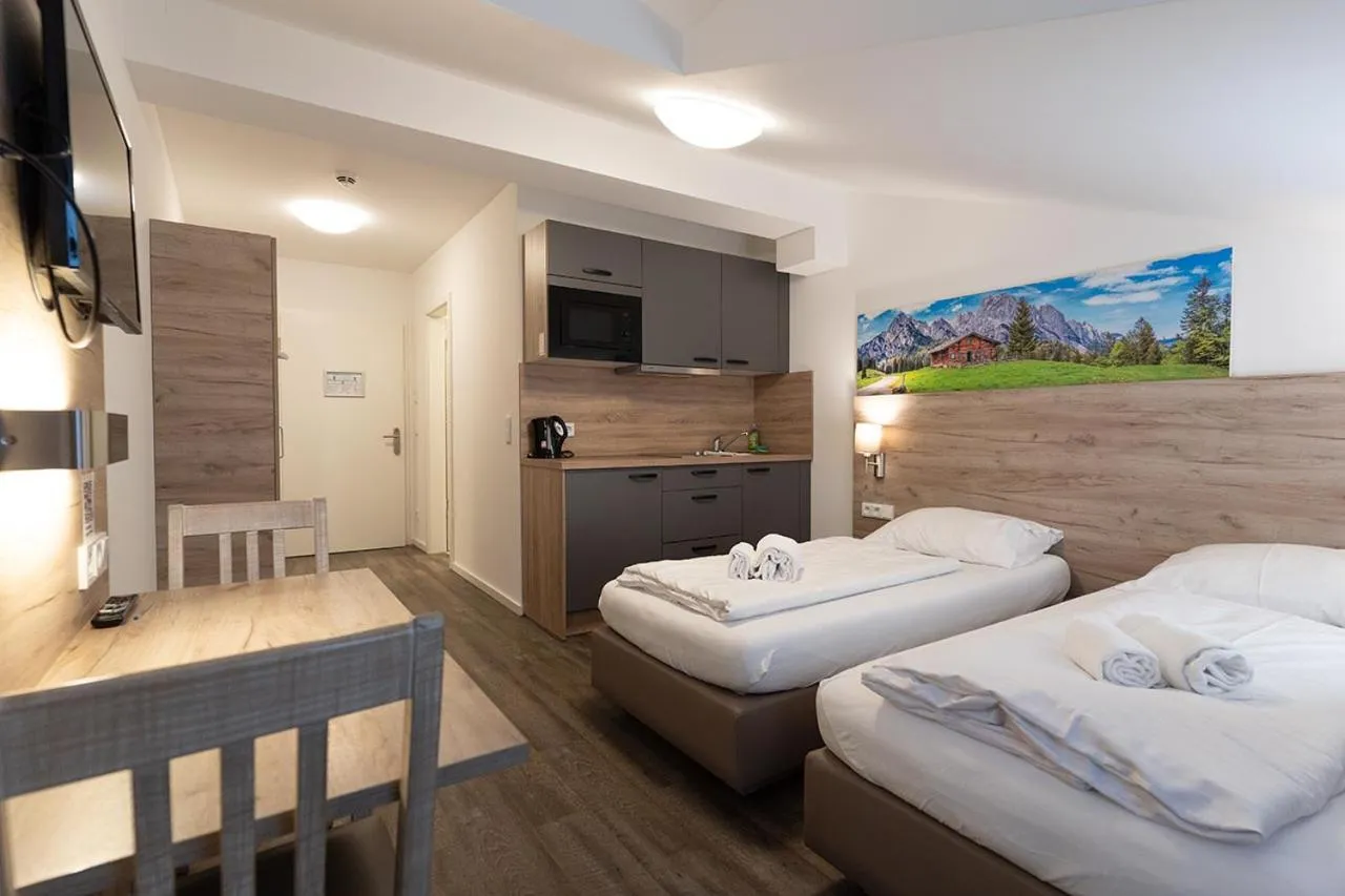 Bed in Aparthotel Oberfeld West München, Selbstversorgerhotel