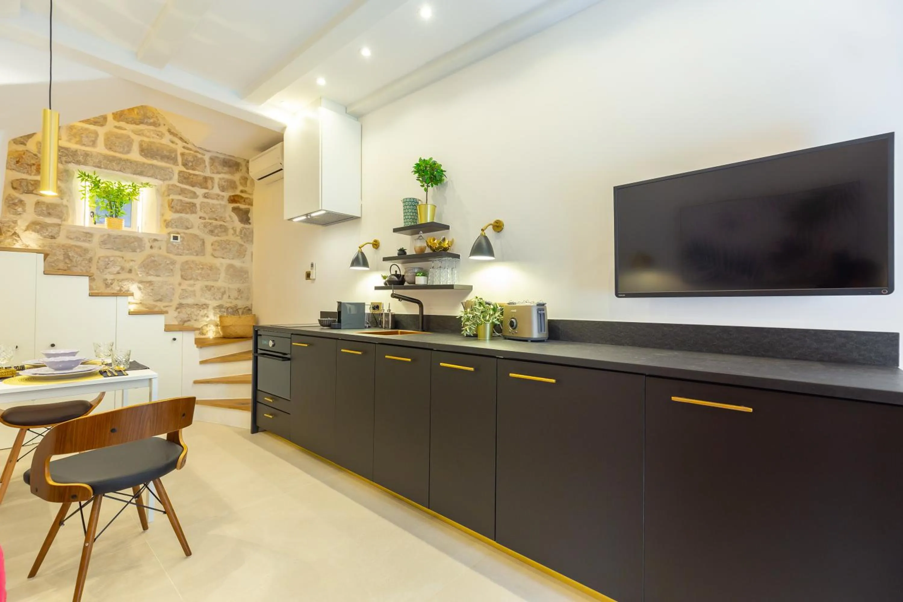 TV and multimedia in Old Town House with Floor Heating & Lush Private Garden
