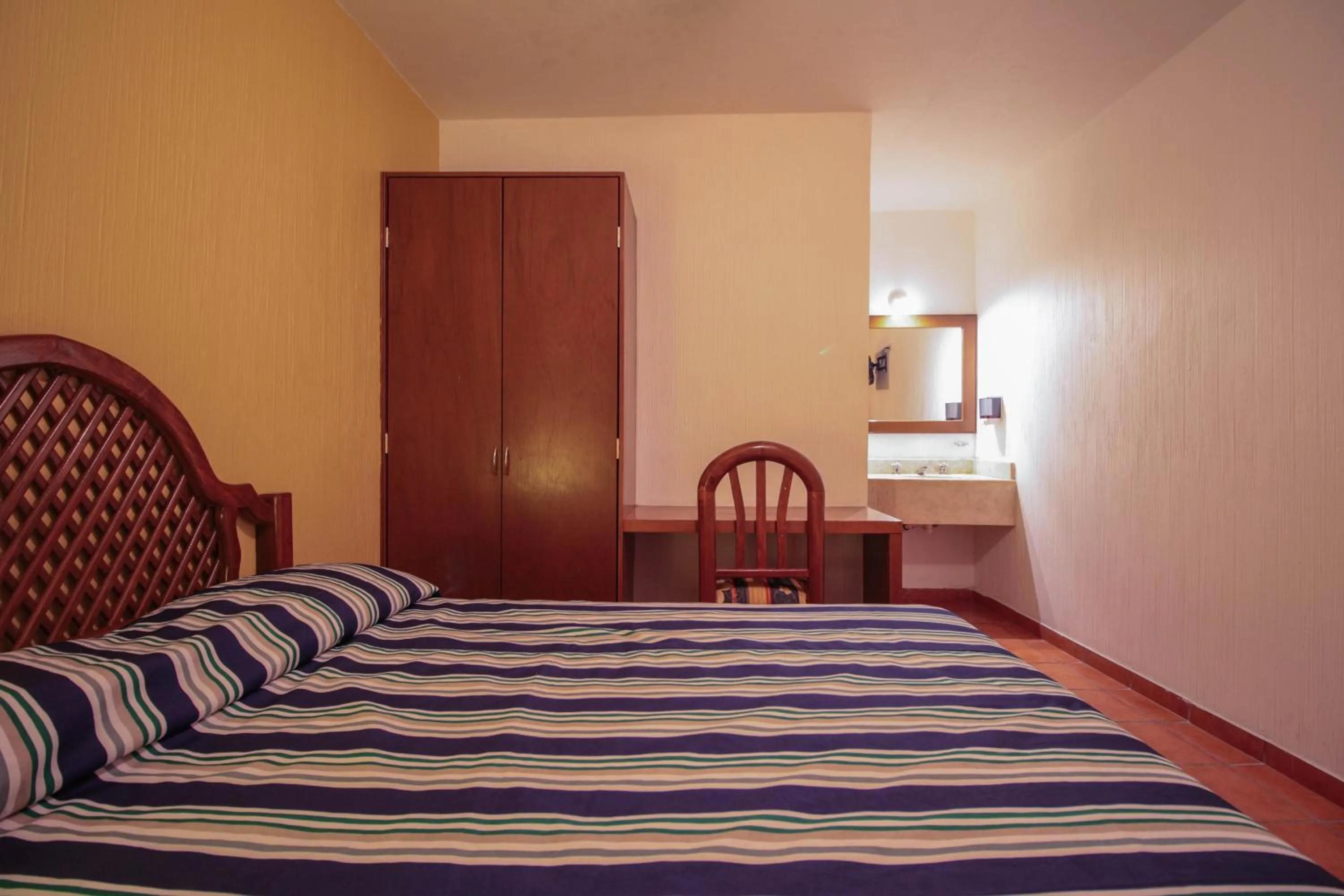 Bed in Hotel Degollado