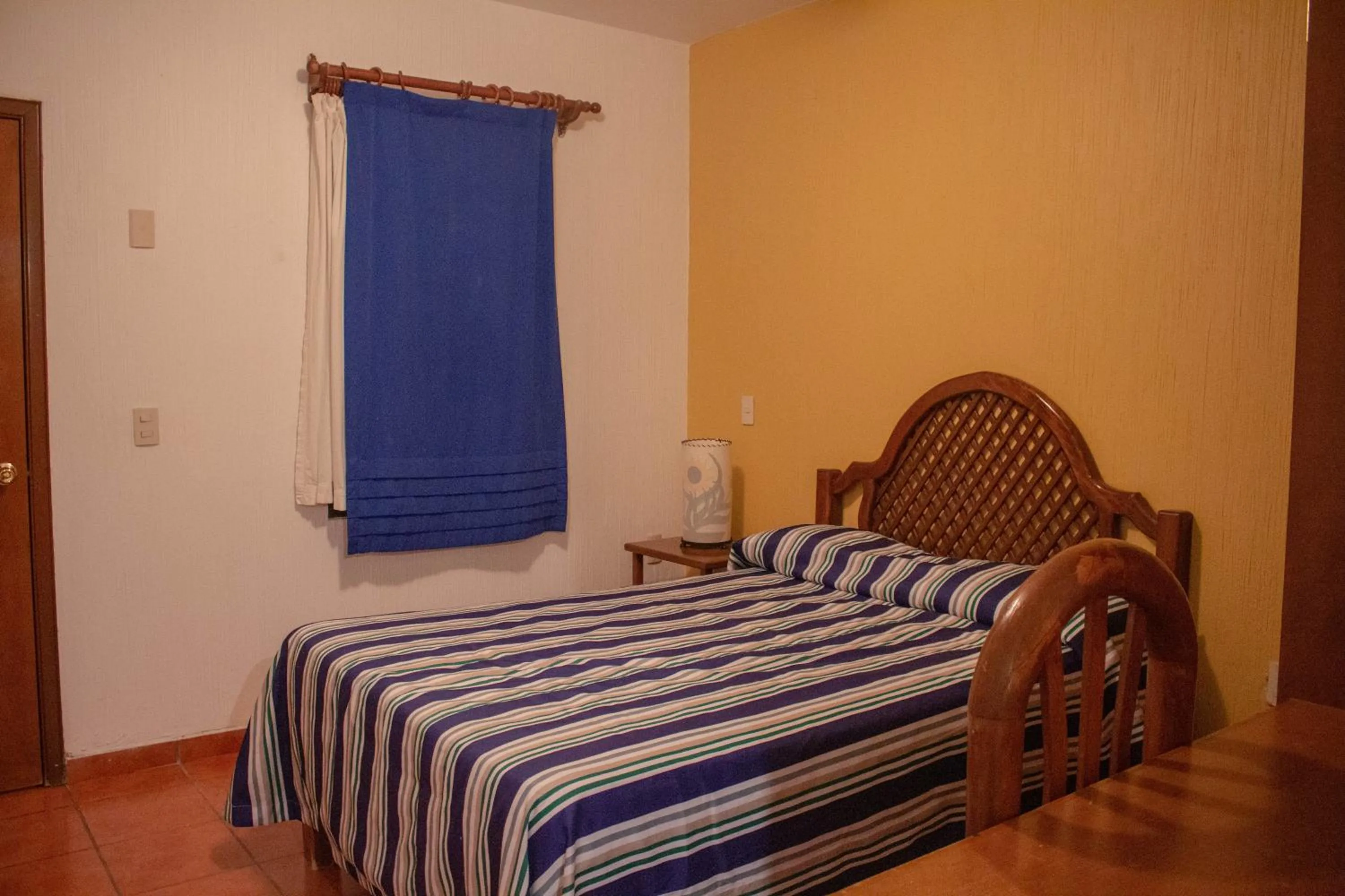 Bed in Hotel Degollado