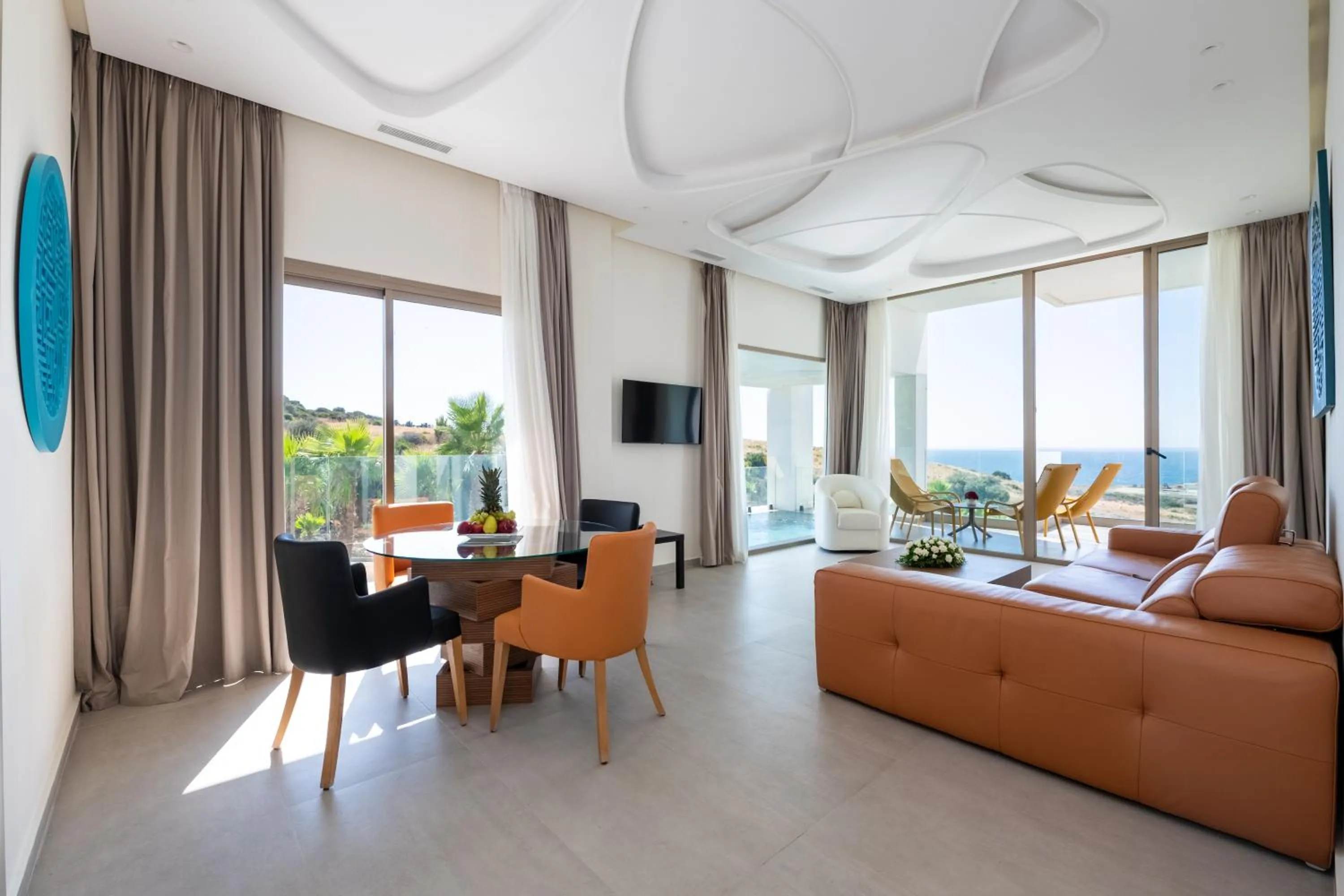 Communal lounge/ TV room in Le Tanger Résidence Hôtelière