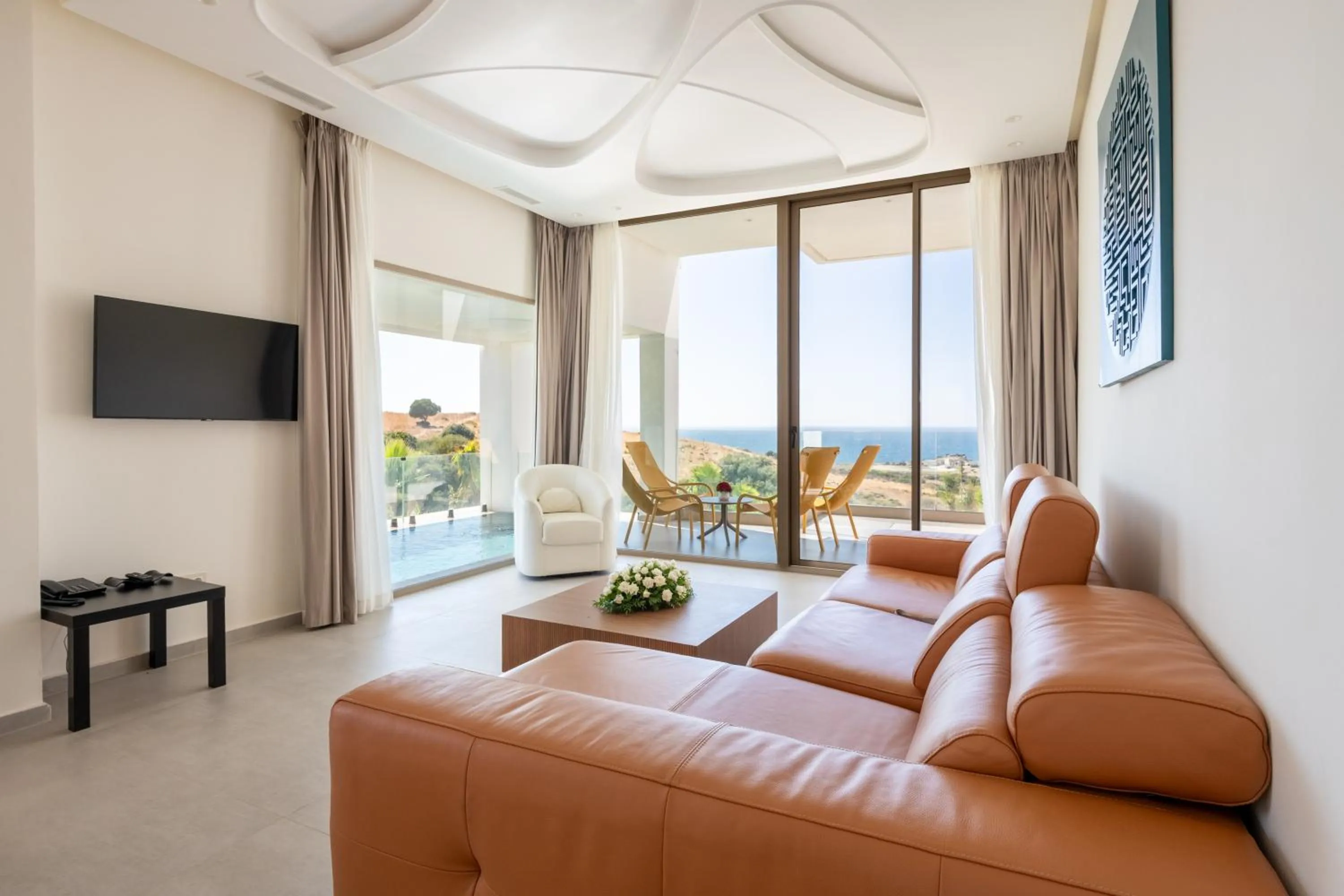 Communal lounge/ TV room in Le Tanger Résidence Hôtelière