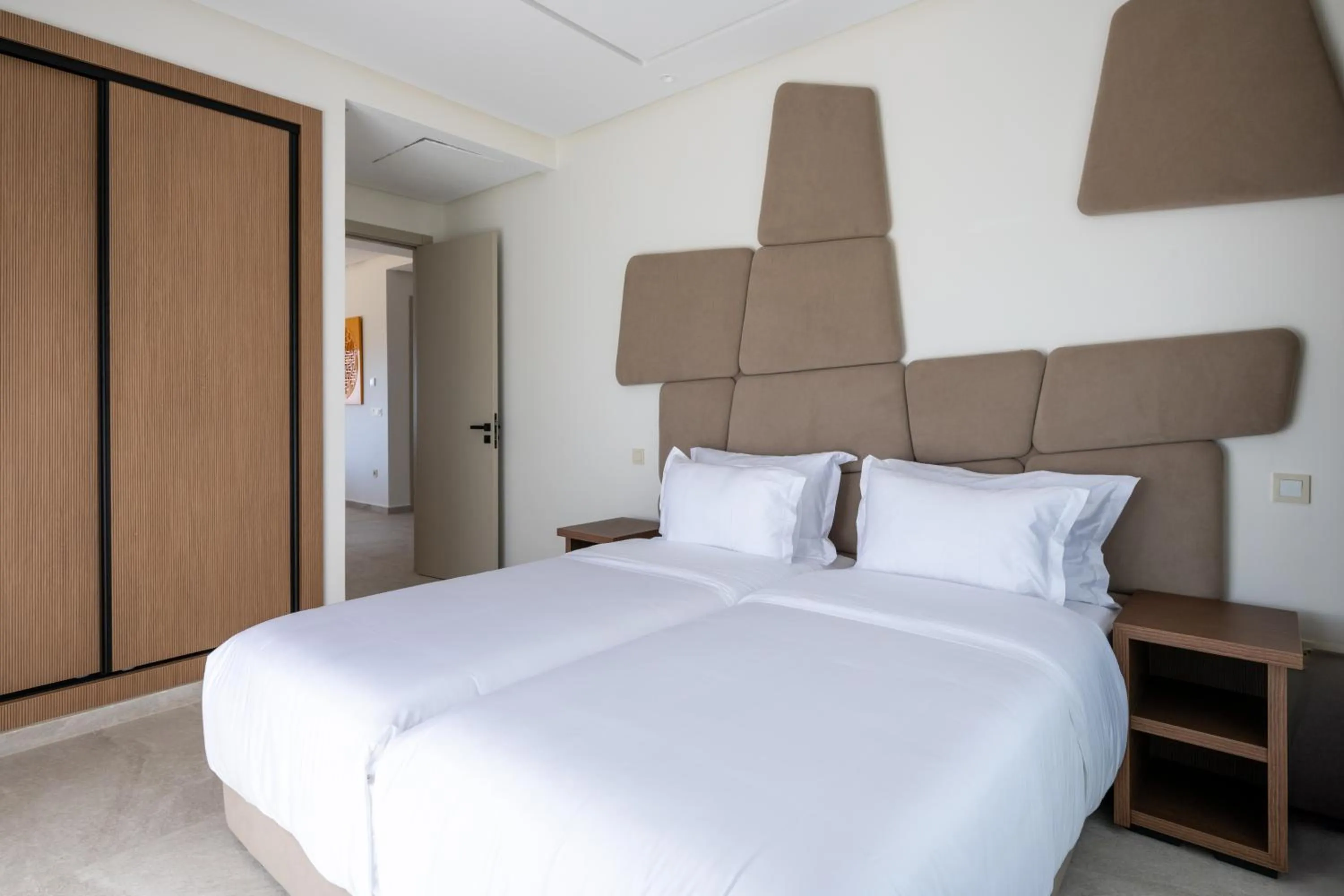 Bed in Le Tanger Résidence Hôtelière