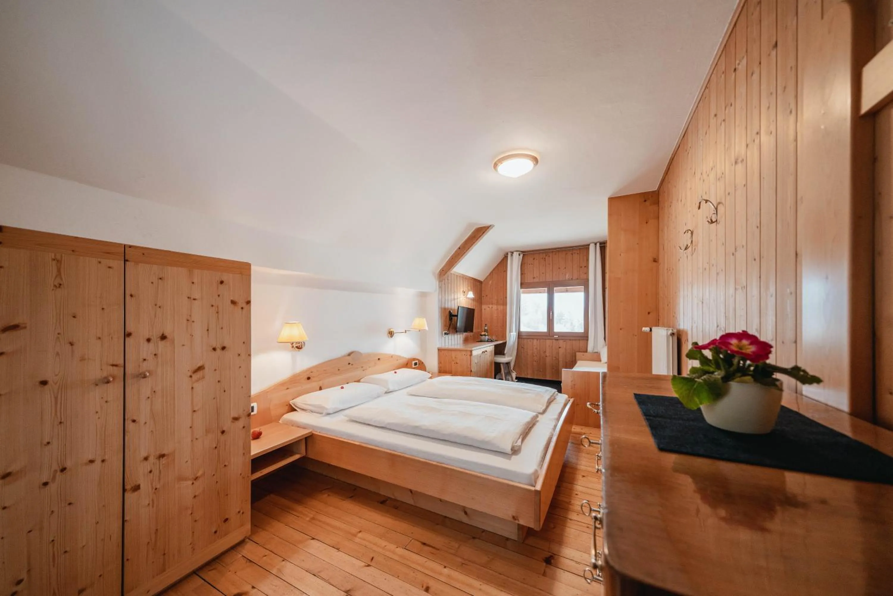 Photo of the whole room, Bed in Golfhotel Sonne
