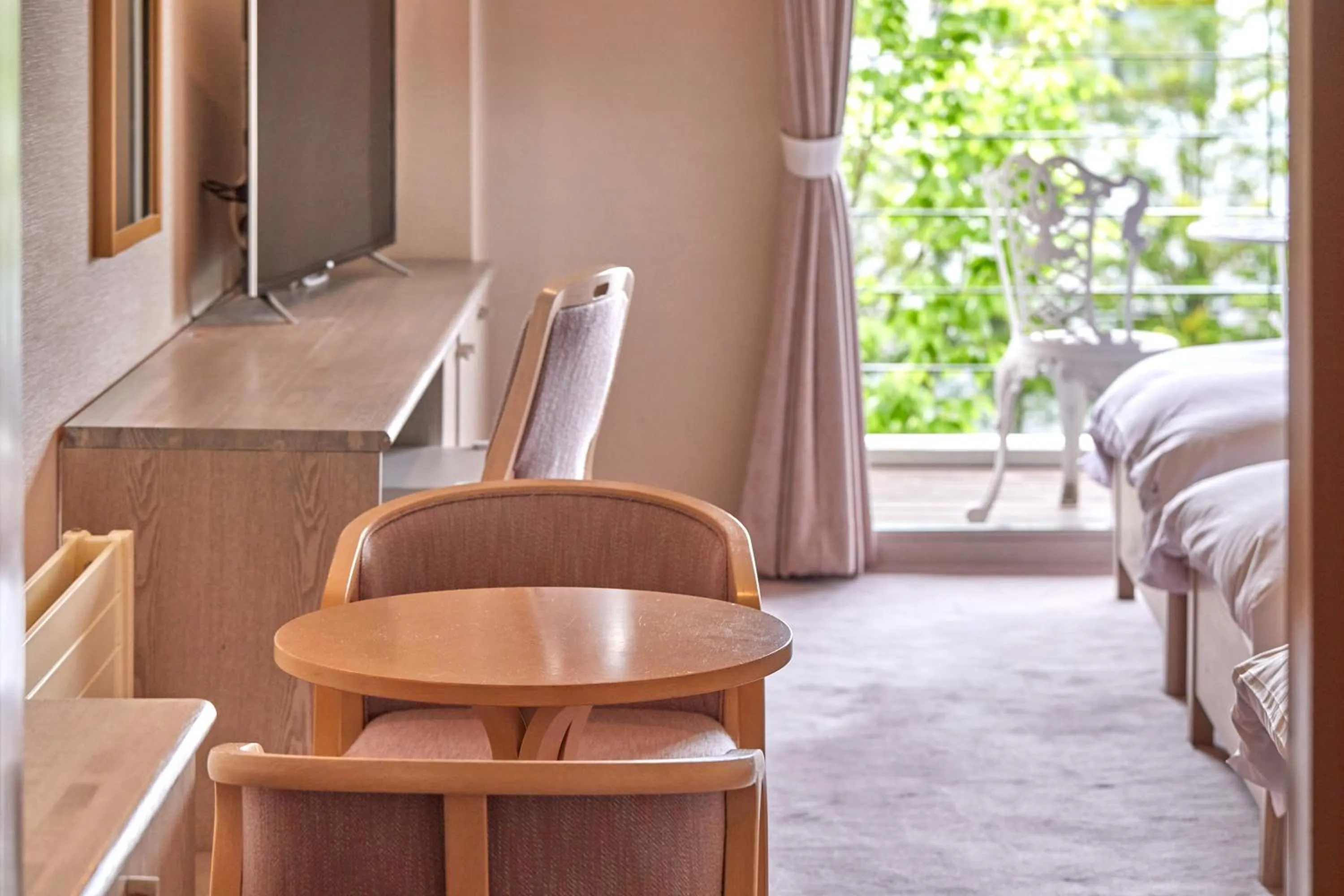 Seating area, Bed in IKOI Villa