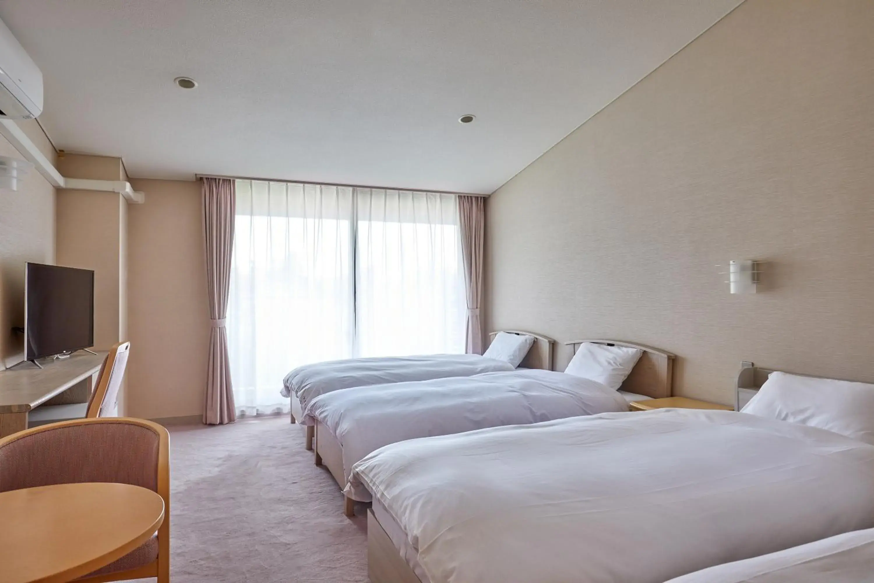 Bed in IKOI Villa Bed in IKOI Villa