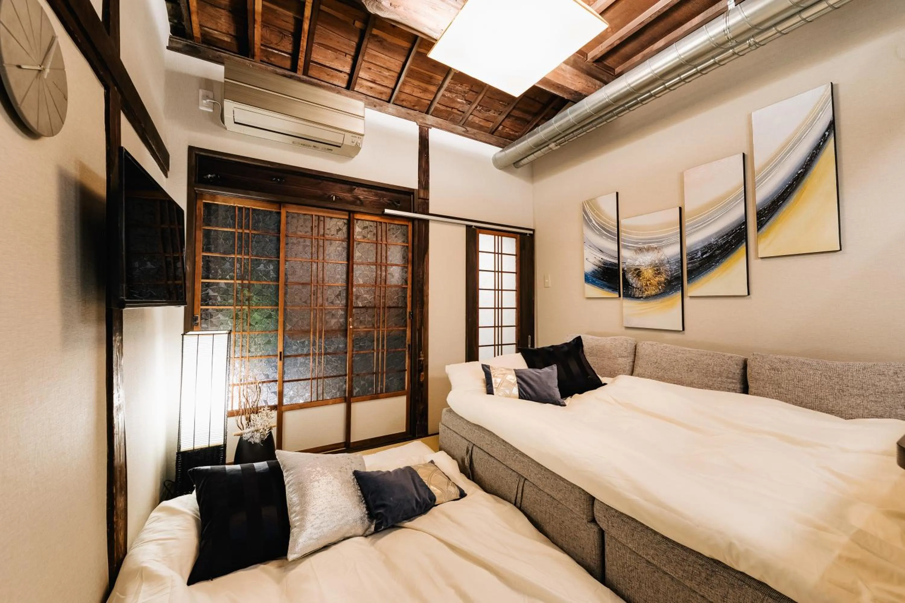 Bed in Prestige Suites Osaka Teradacho