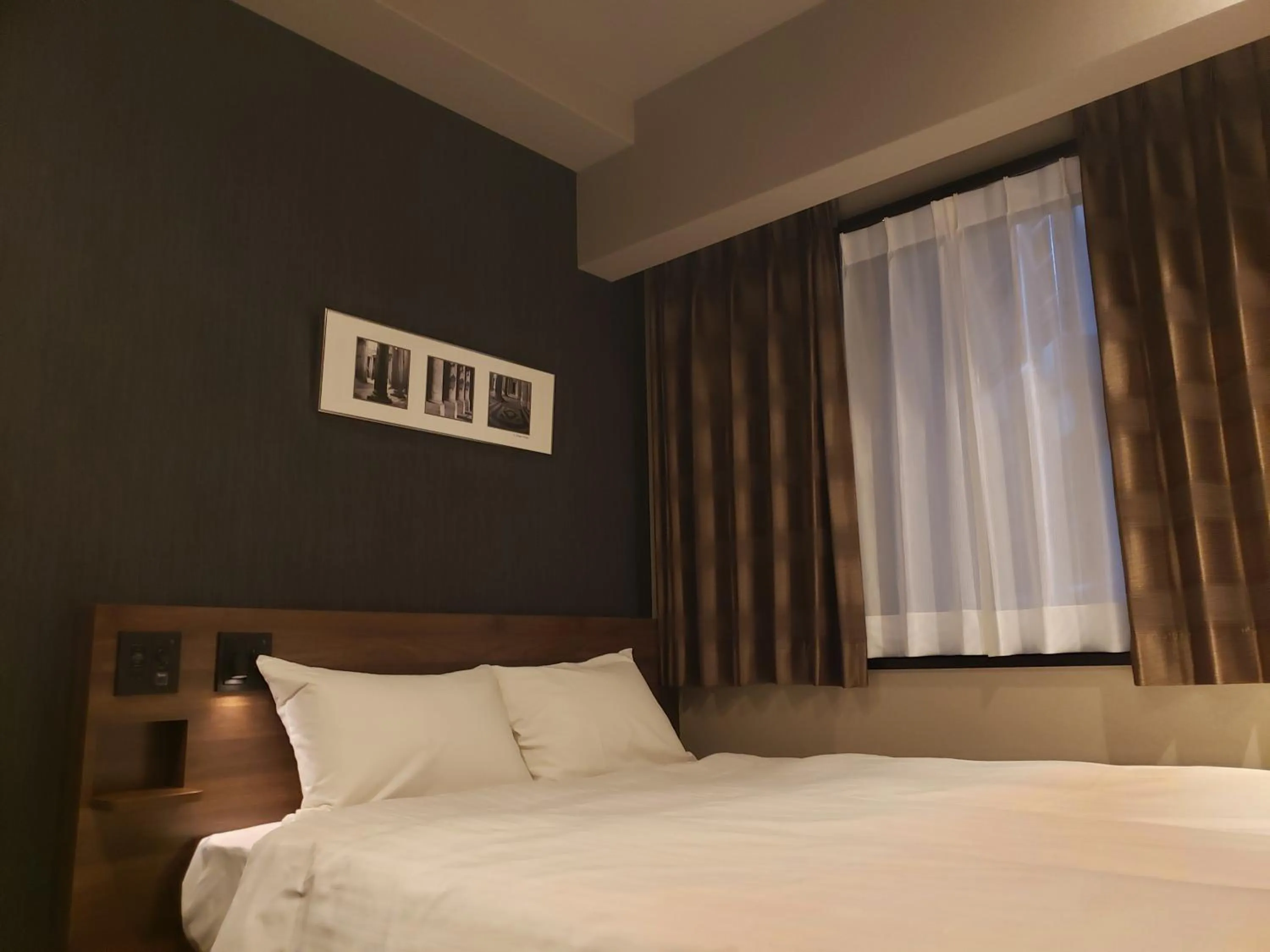 Bed in Welina Hotel Premier Nakanoshima EAST