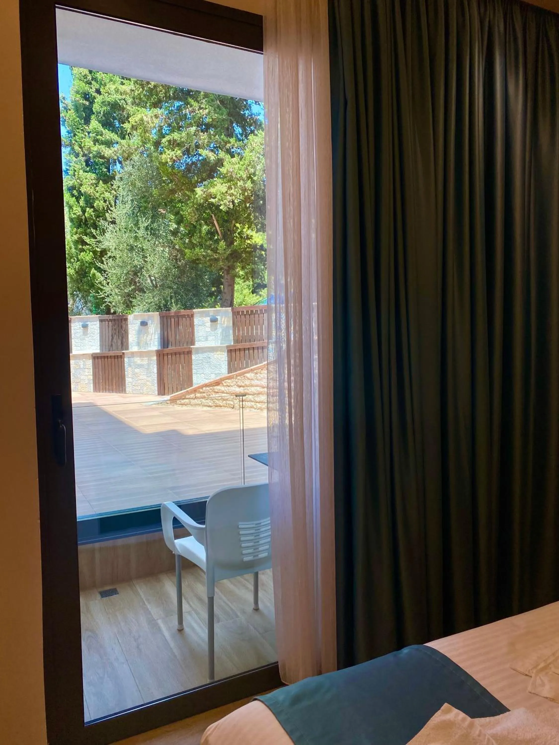 View (from property/room), Bed in HOTEL DENOEL