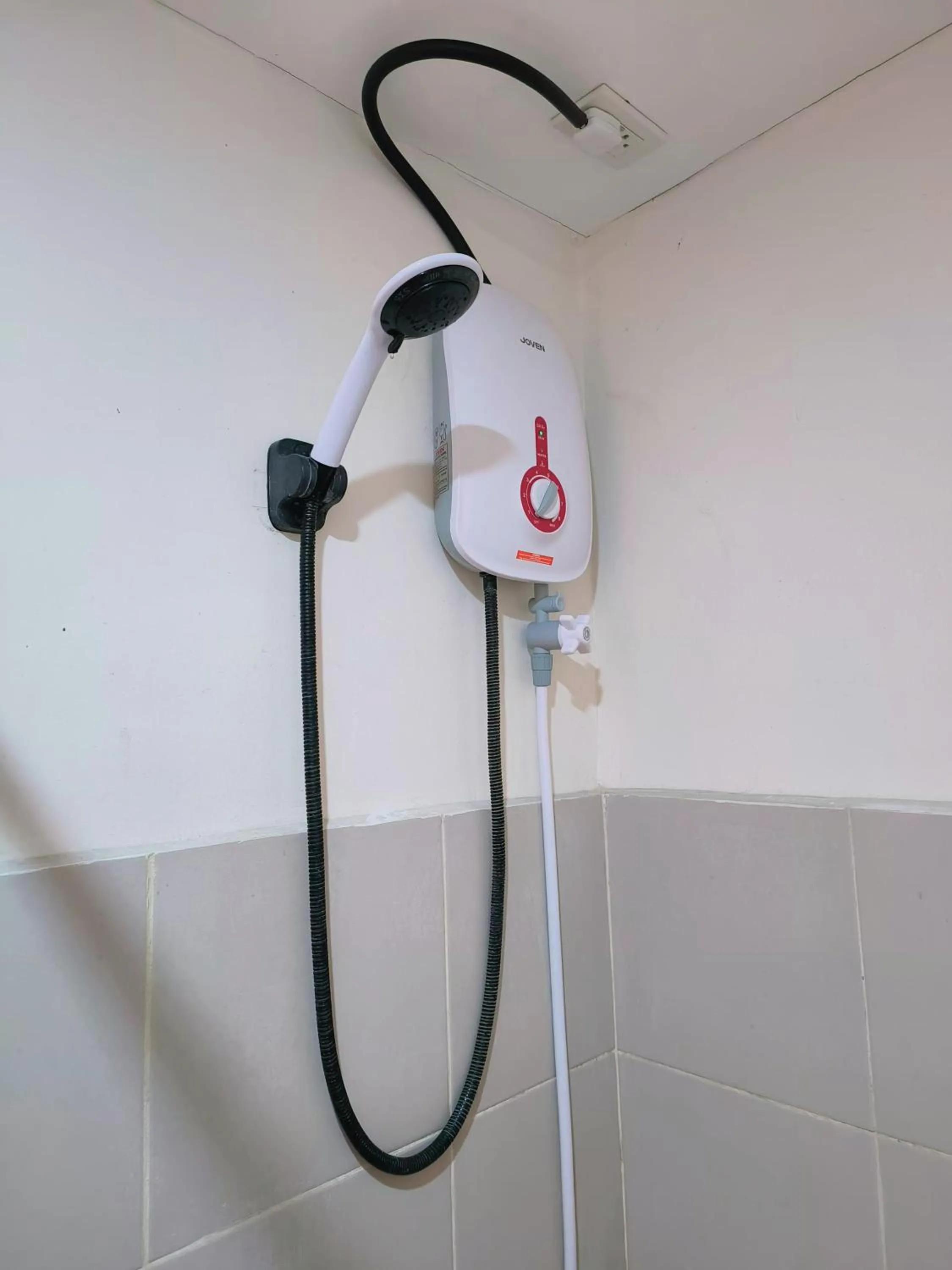 Shower in Davao Condo 2BR Pool Wifi Netflix