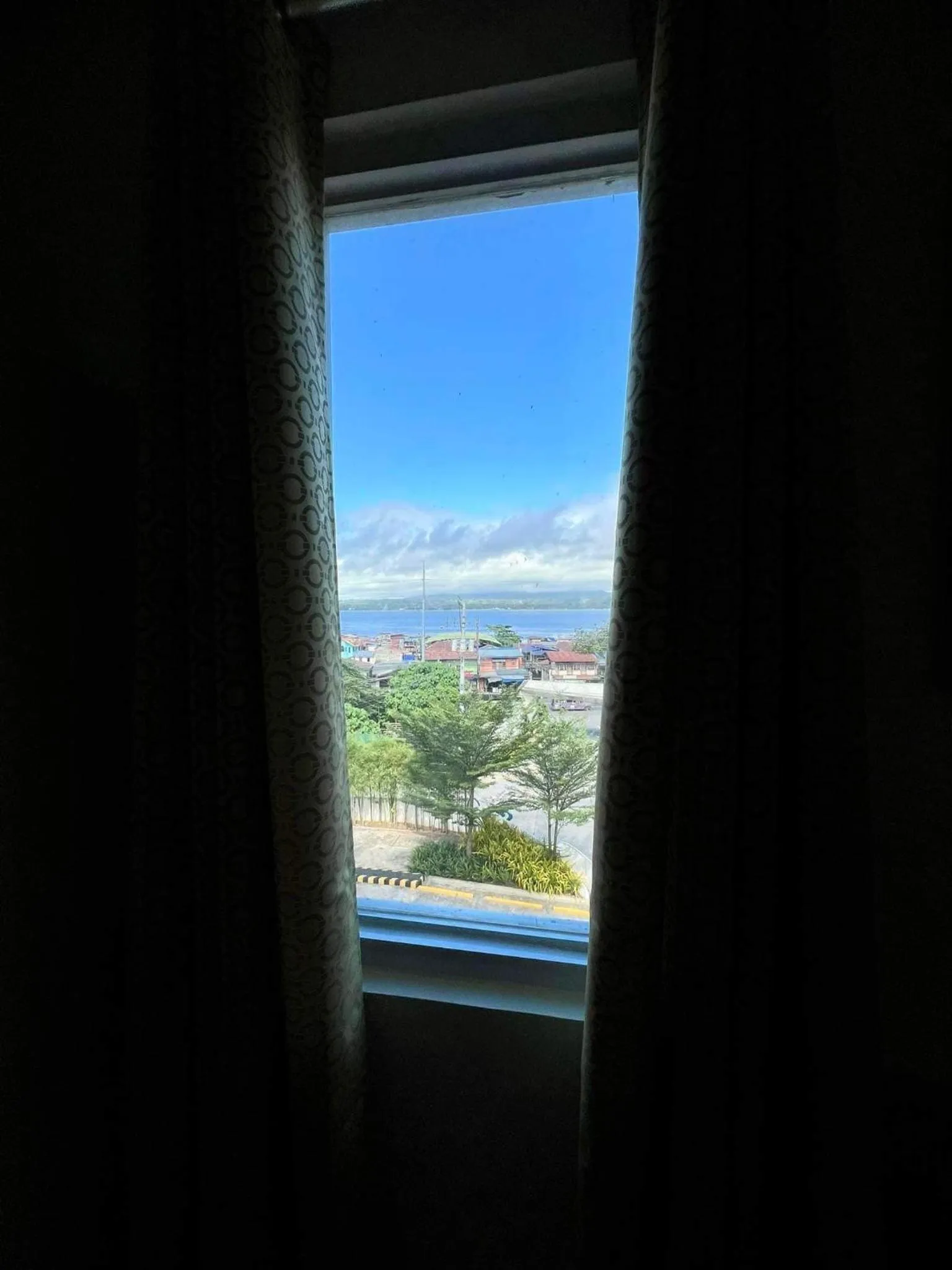 Bedroom in Davao Condo 2BR Pool Wifi Netflix